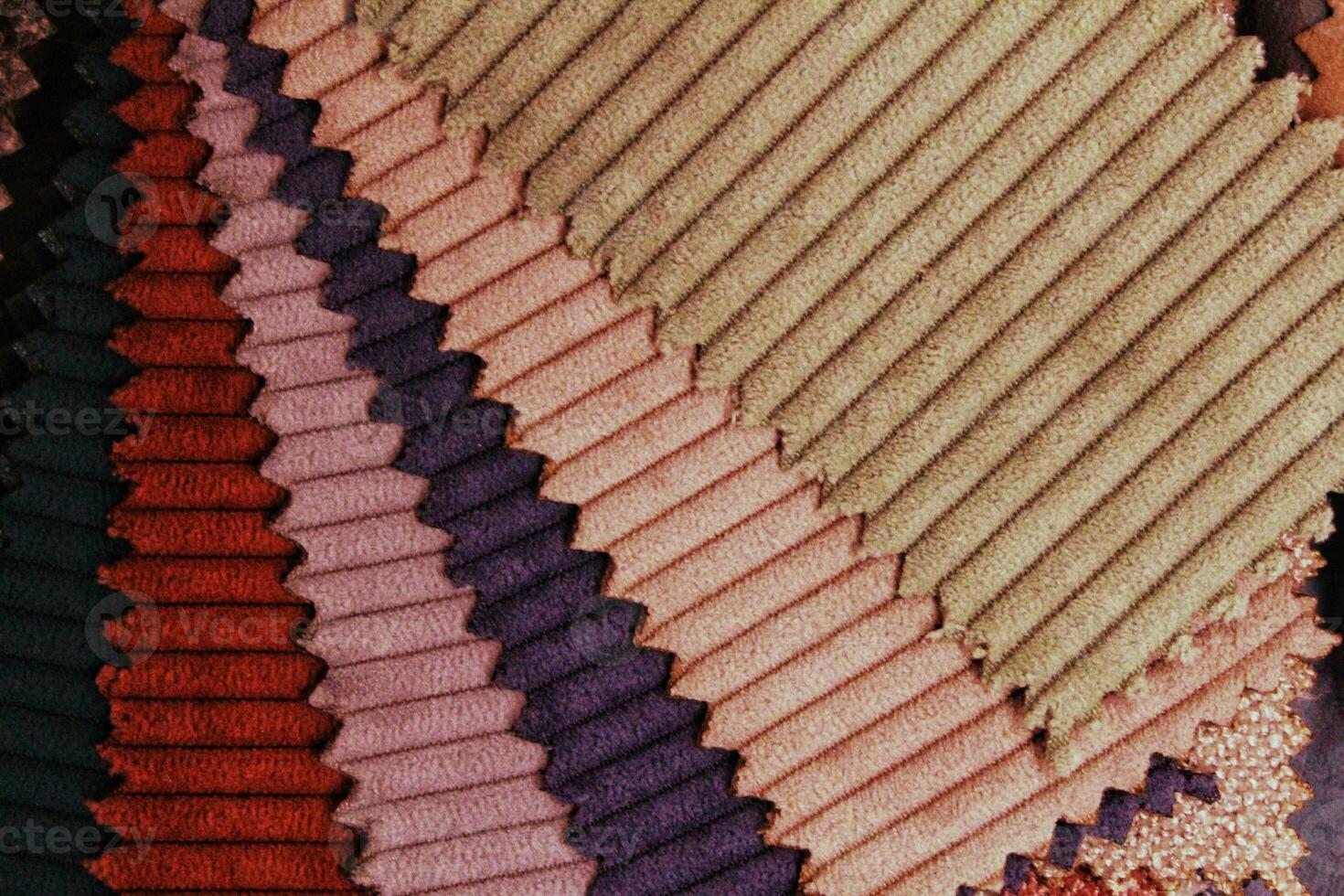 Close-up of colorful upholstery fabric samples. Textile texture background photo