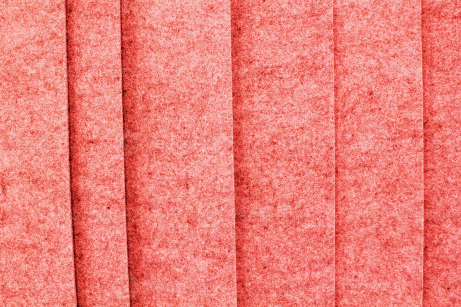 Soft pink stripes felt texture material background. Surface of fabric wool material for handmade creative. Scrapbooking, felting item. Natural rough textile fiber pattern photo