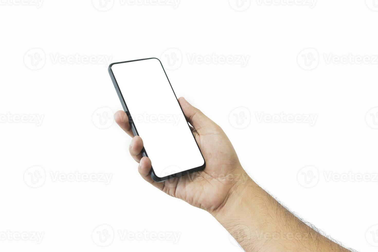 Male hand holding black smartphone with blank screen and modern frameless design two positions angled copy space isolated on white background. close-up hand of man hold mobile phone. Space for text. photo