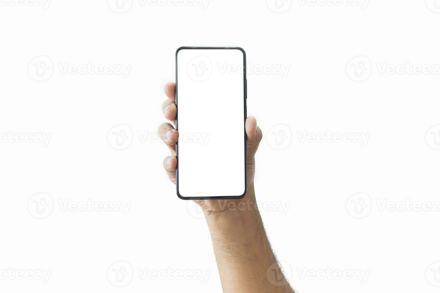 Male hand holding black smartphone with blank screen and modern frameless design two positions angled copy space isolated on white background. close-up hand of man hold mobile phone. Space for text. photo