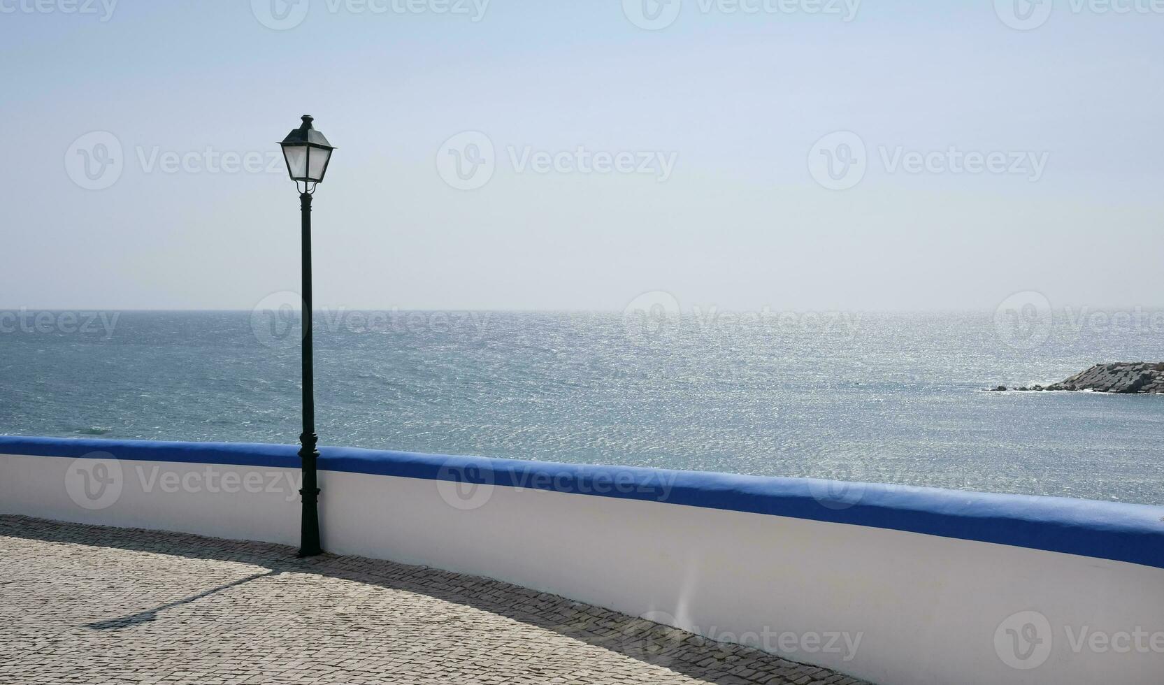 Coastal road with ocean view in Ericeira, Portugal photo