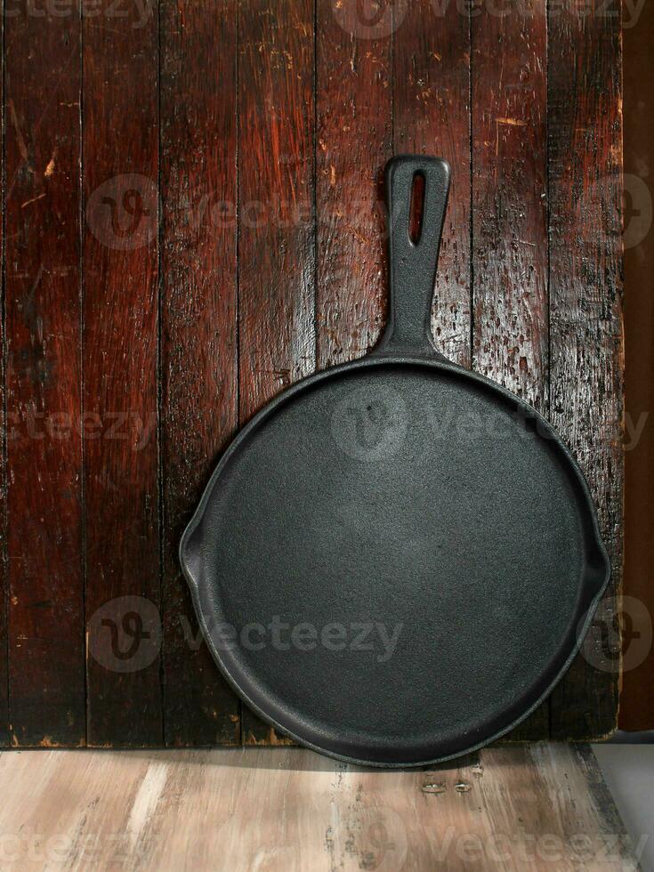 Empty Brand New Cast Iron Skillet photo