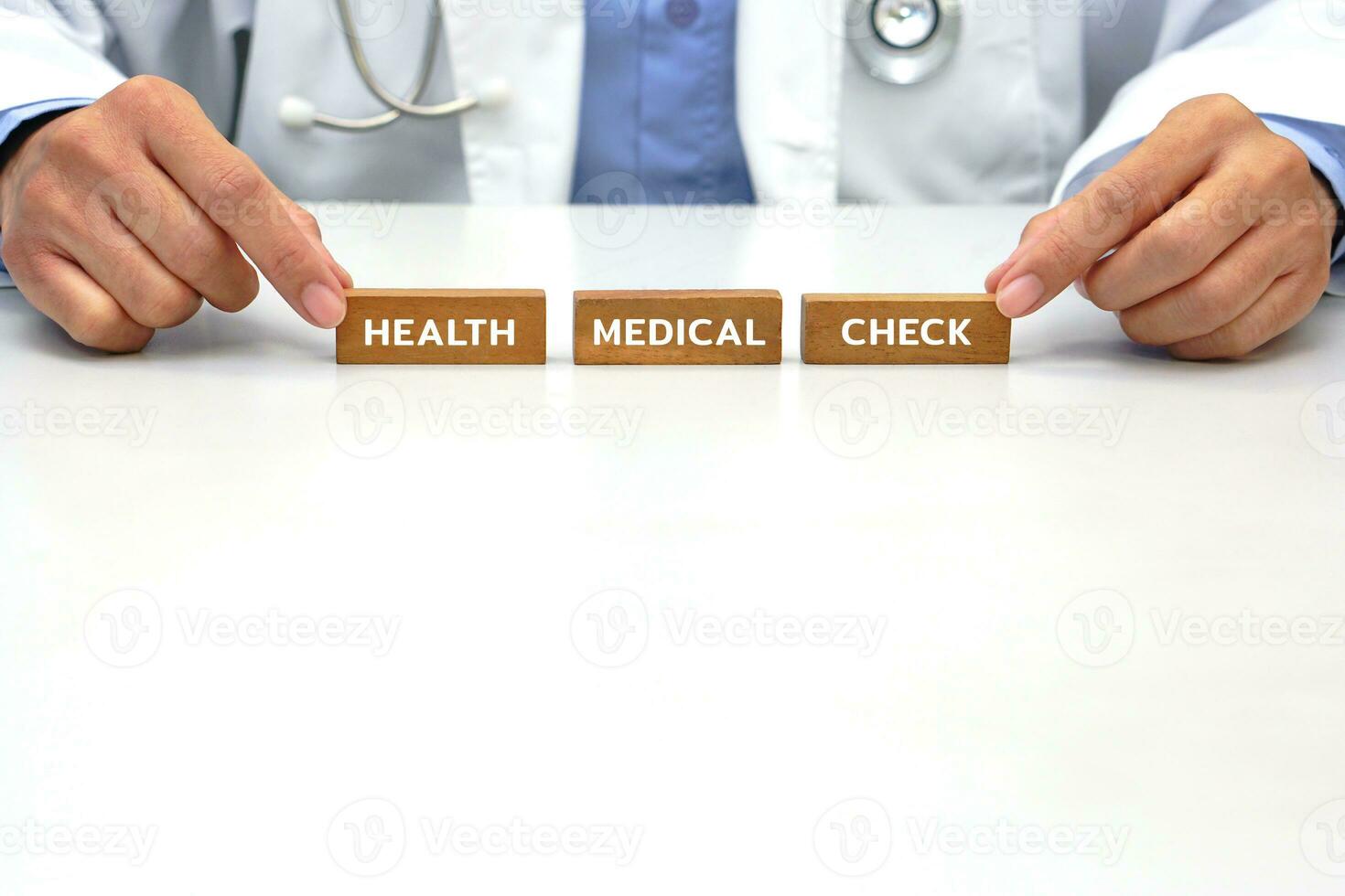 Hand of doctor holding a wooden block with text icon symbol. Medical and health concept. photo