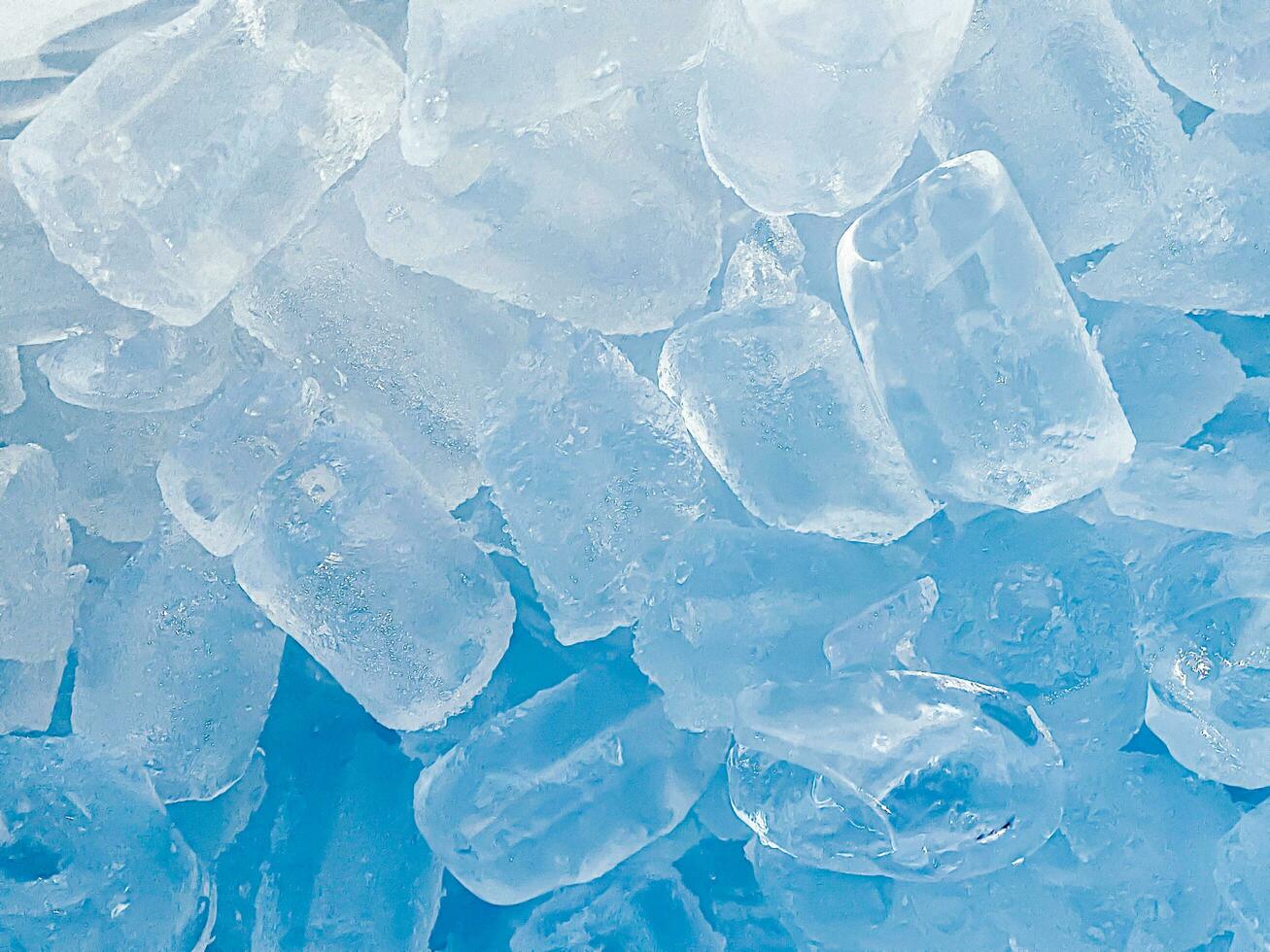 Ice cubes background, ice cube texture, ice wallpaper It makes me feel fresh and feel good. In the summer, ice and cold drinks will make us feel relaxed, Made for beverage or refreshment business. photo