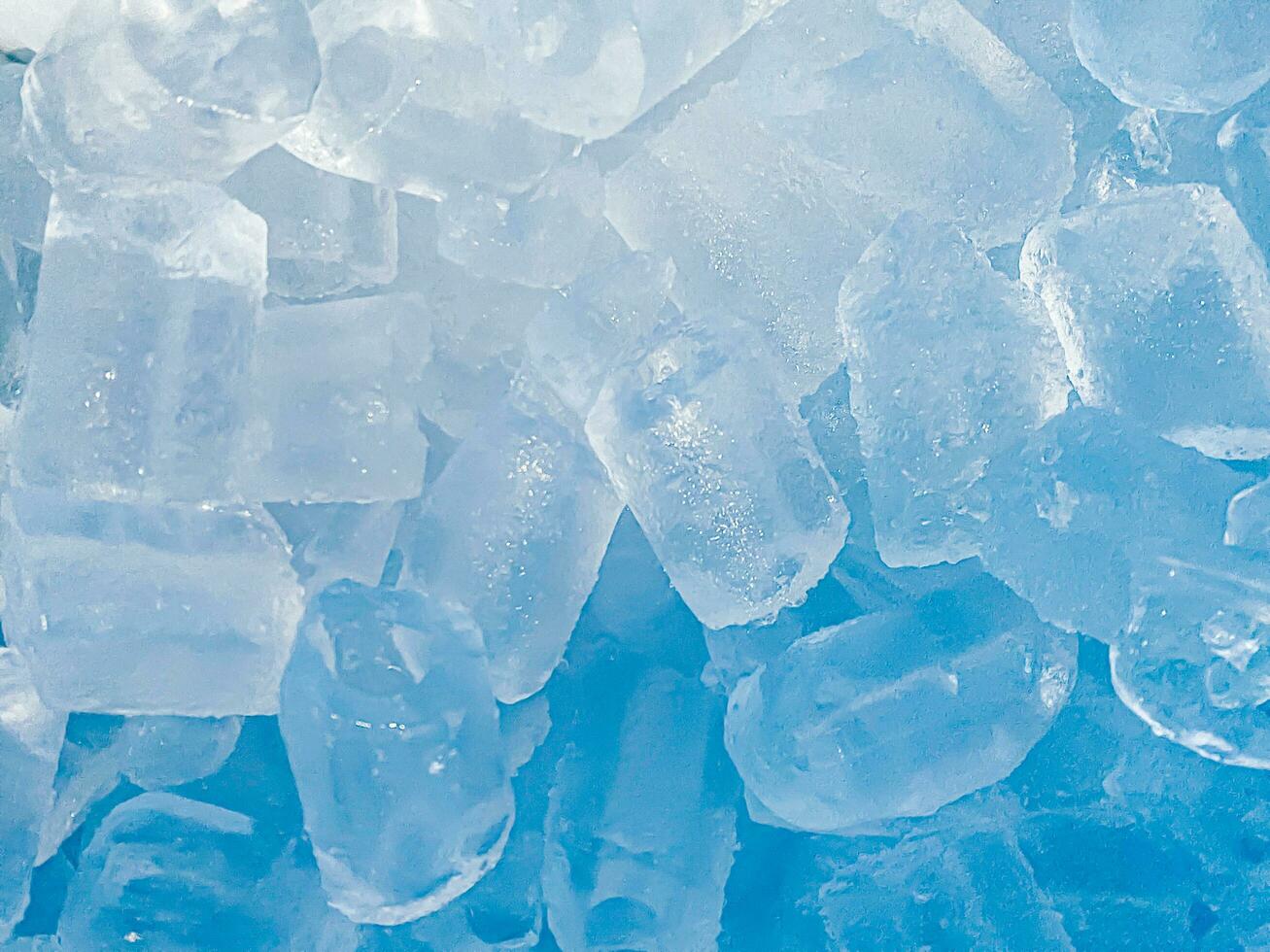 Ice cubes background, ice cube texture, ice wallpaper It makes me feel fresh and feel good. In the summer, ice and cold drinks will make us feel relaxed, Made for beverage or refreshment business. photo