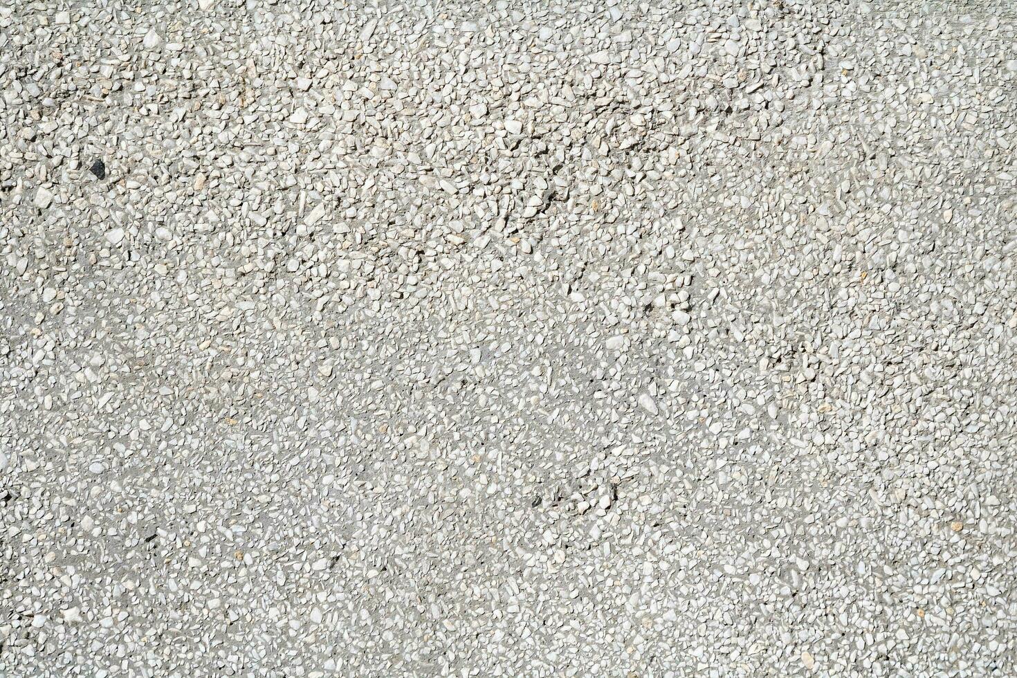 Cracked and abstract grunge texture. Aged material surface backdrop. Weathered effect pattern. Old and dirty background. photo