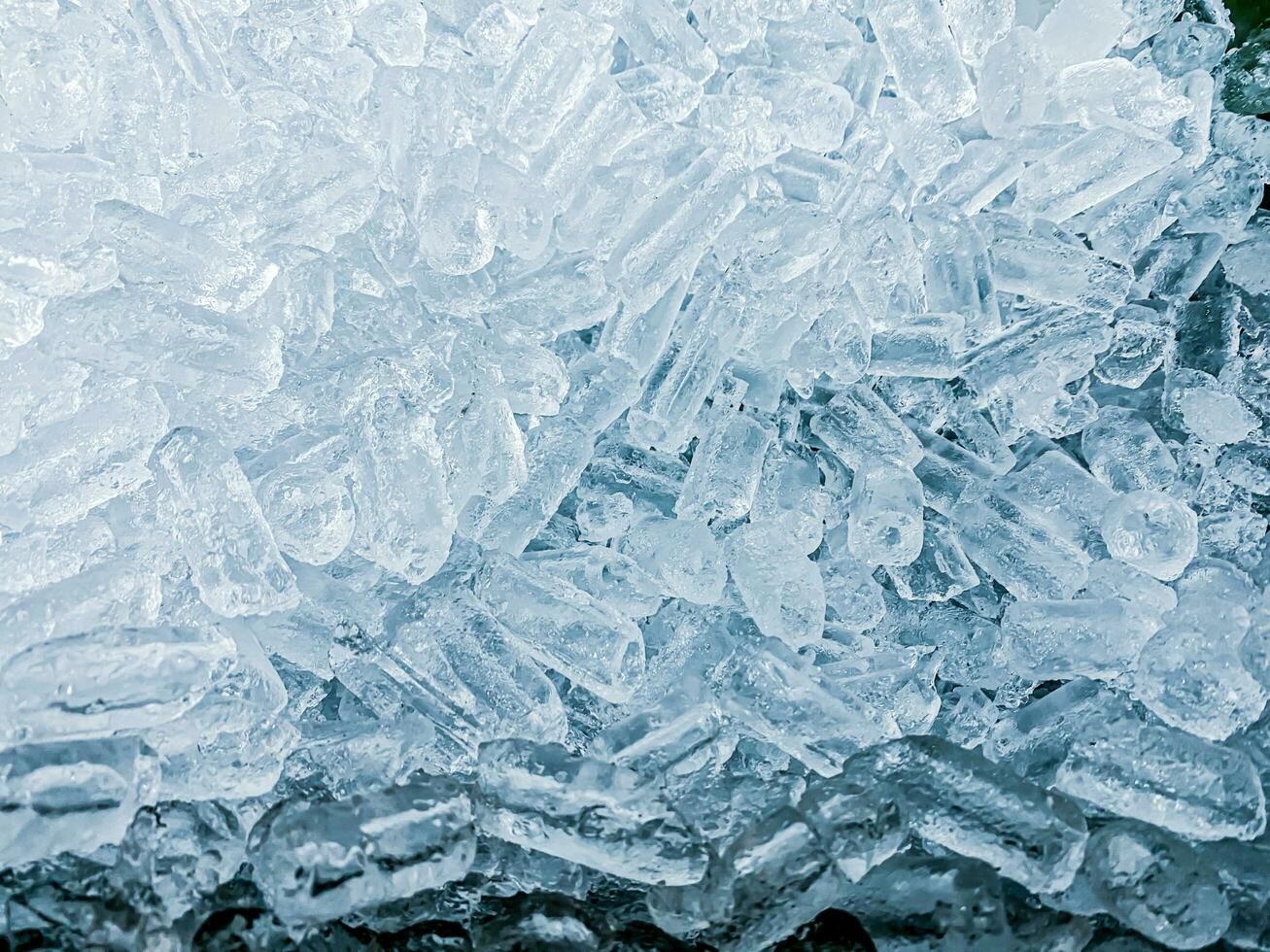 Ice cubes background, ice cube texture, ice wallpaper It makes me feel fresh and feel good. In the summer, ice and cold drinks will make us feel relaxed, Made for beverage or refreshment business. photo