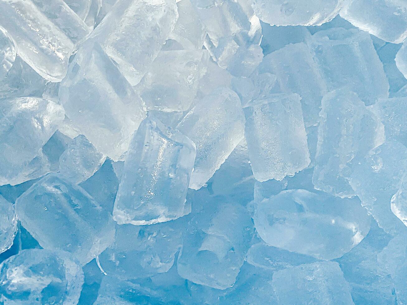 Ice cubes background, ice cube texture, ice wallpaper It makes me feel fresh and feel good. In the summer, ice and cold drinks will make us feel relaxed, Made for beverage or refreshment business. photo