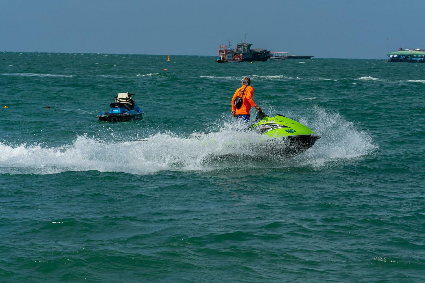 PATTAYA, THAILAND - December 31, 2022 Pattaya beach is crowded with many tourists. After opening Thailand, opening the country to welcome foreign tourists. after the COVID situation unfolds photo