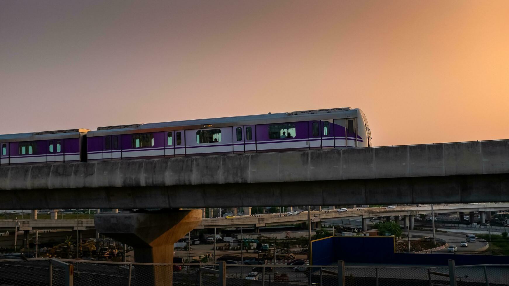 Nonthaburi-Thailand April 9, 2023 MRT purple line Sky train in the sunset evening at Bang Yai, Nonthaburi Thailand. photo