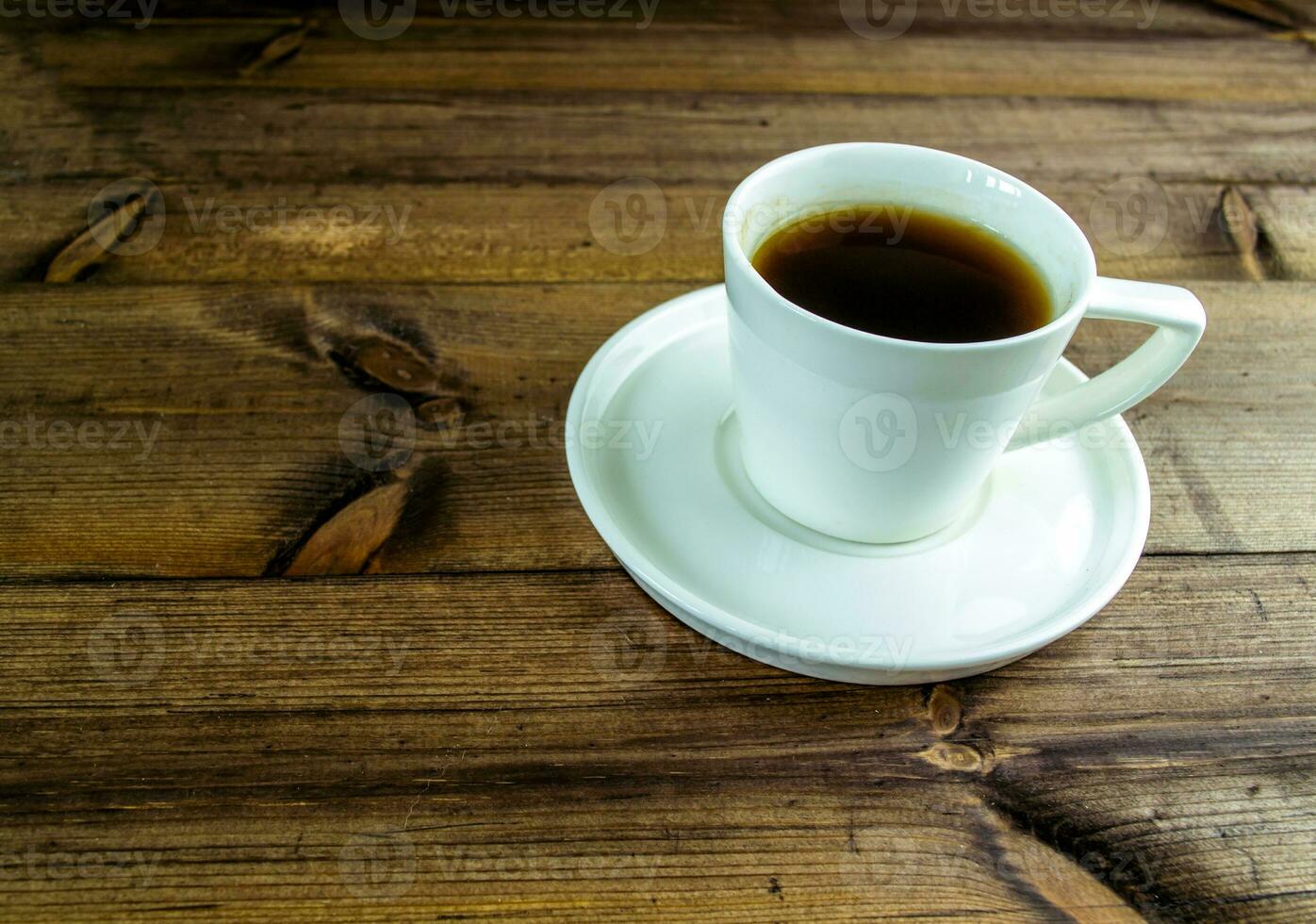 Coffee in a cup on the table. photo