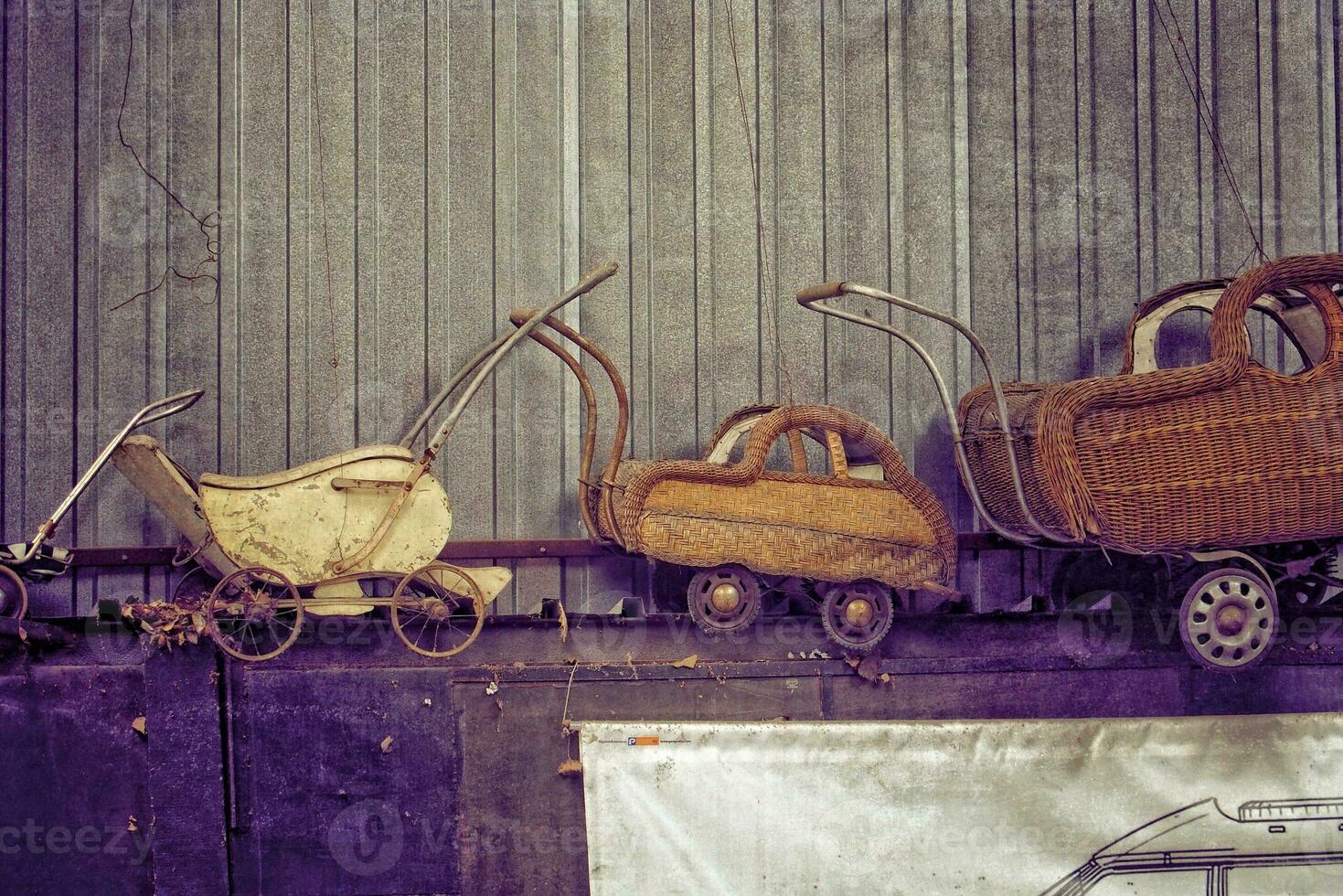 old vintage retro baby prams in the museum photo