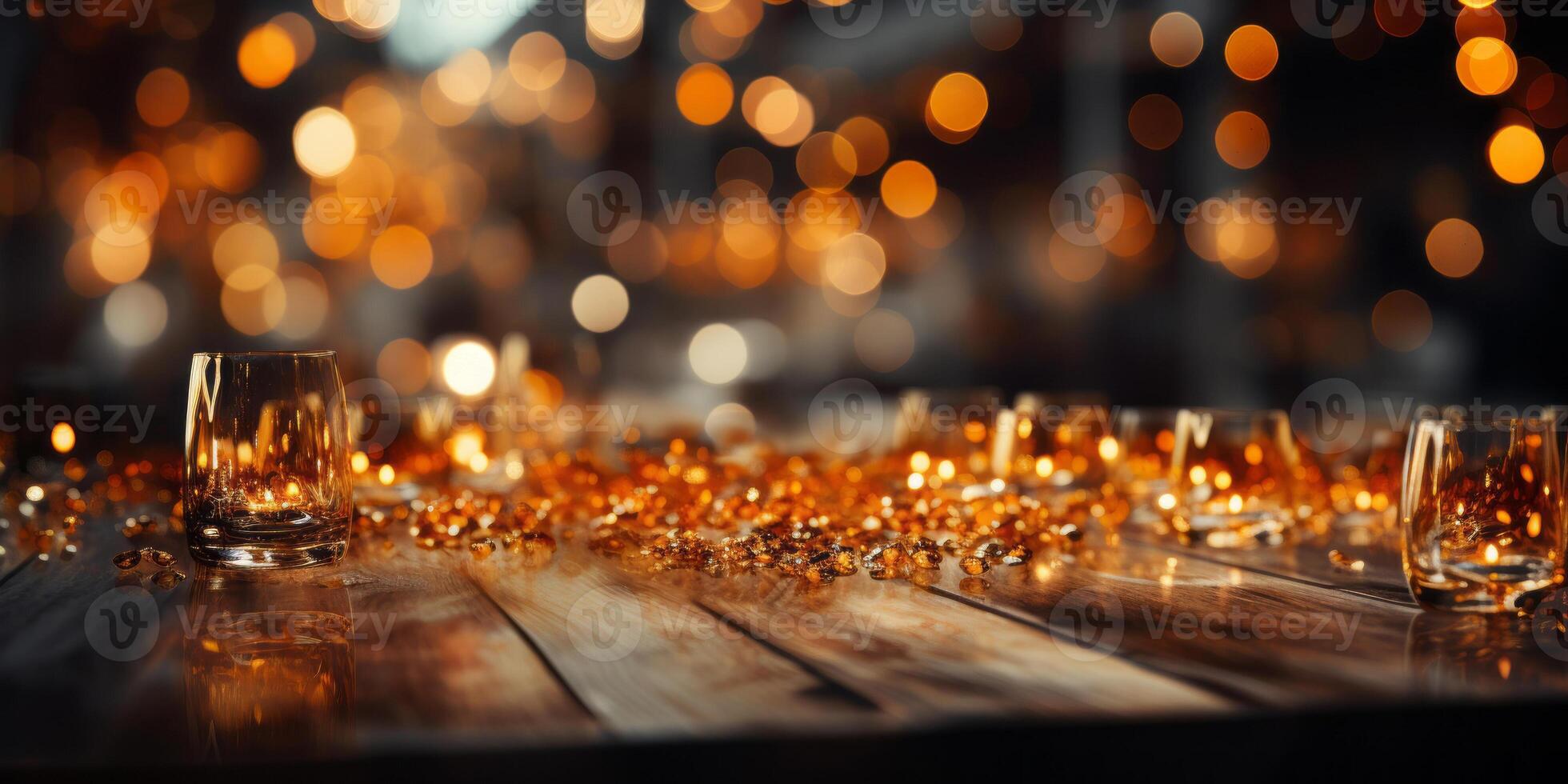 bokeh background with gold lights on a table . photo