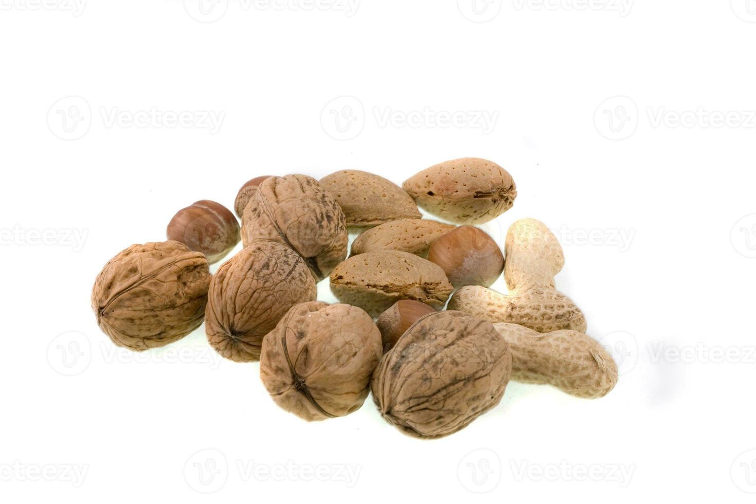 fresh healthy raw ripe nuts isolated on white background photo