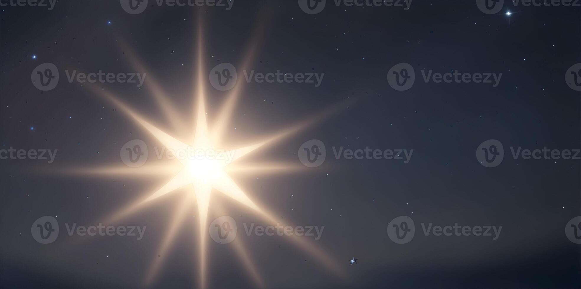 A single star receiving light from above. One standing star. Shallow depth of field. photo
