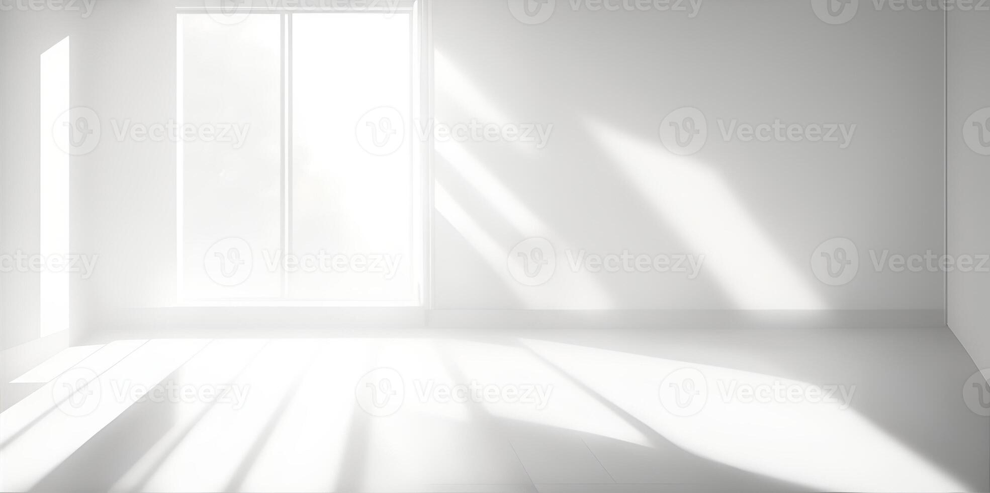 White minimalistic room with blank walls and sunlight streaming through windows. photo