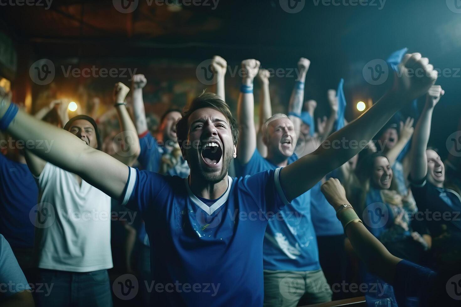 Group of Soccer Fans Cheering Screaming Raising Hands. photo