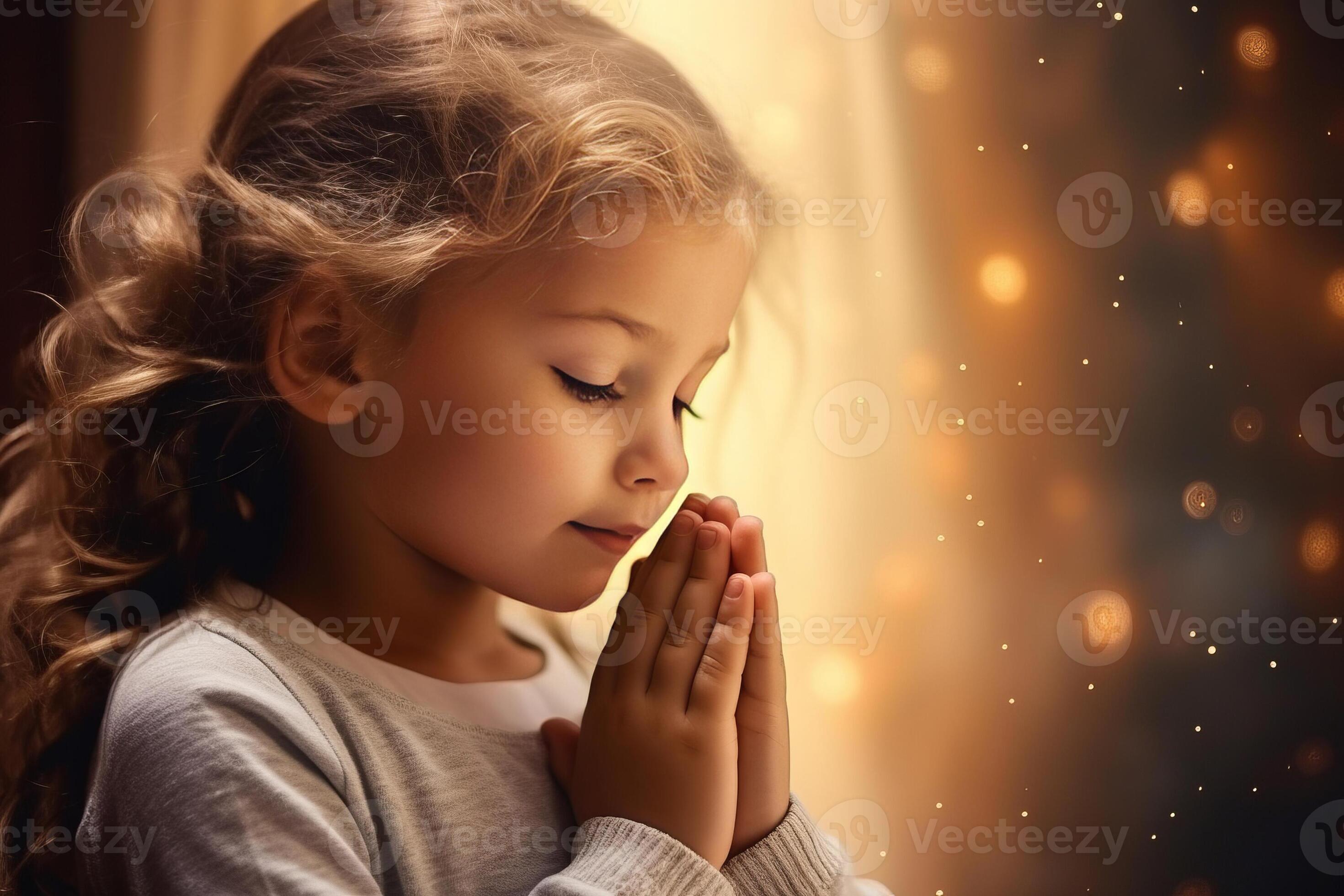 cute small girl praying in the church and Jesus giving blessing