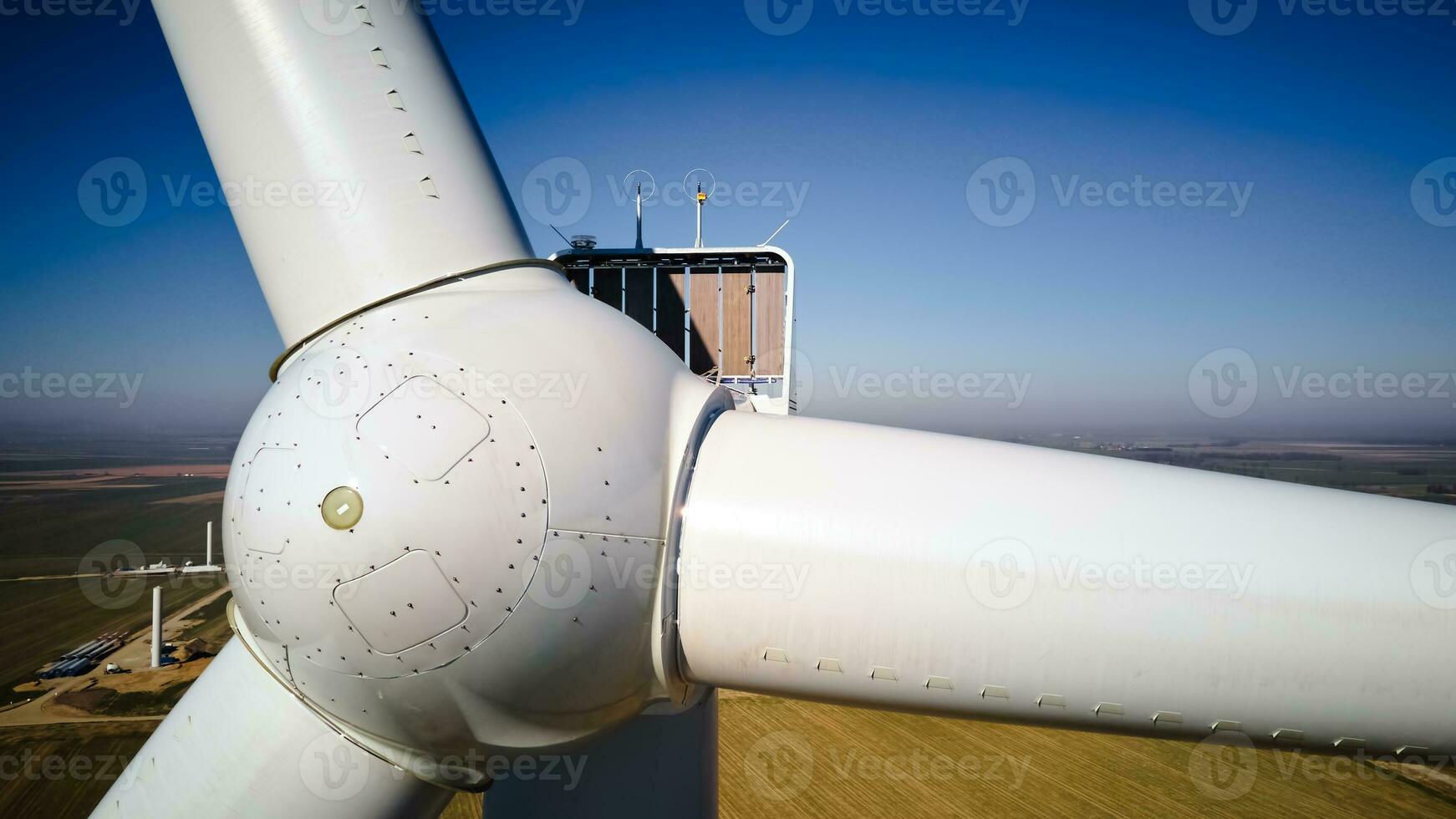 Aerial view of part of windmill turbine in countryside, Green energy photo