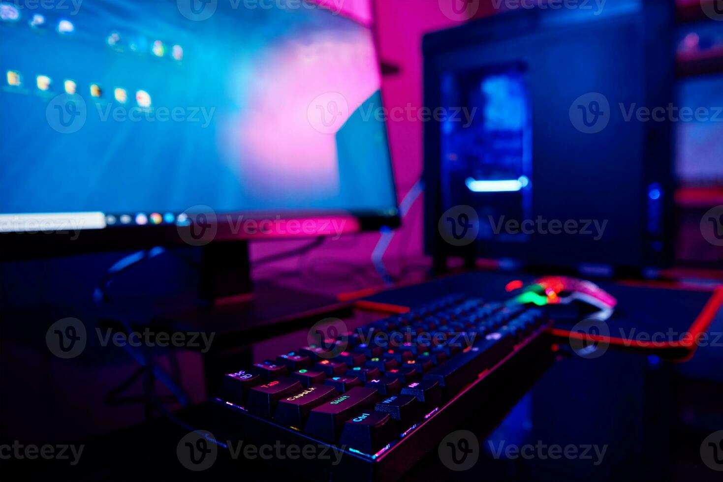 Computer game workplace in dark room photo