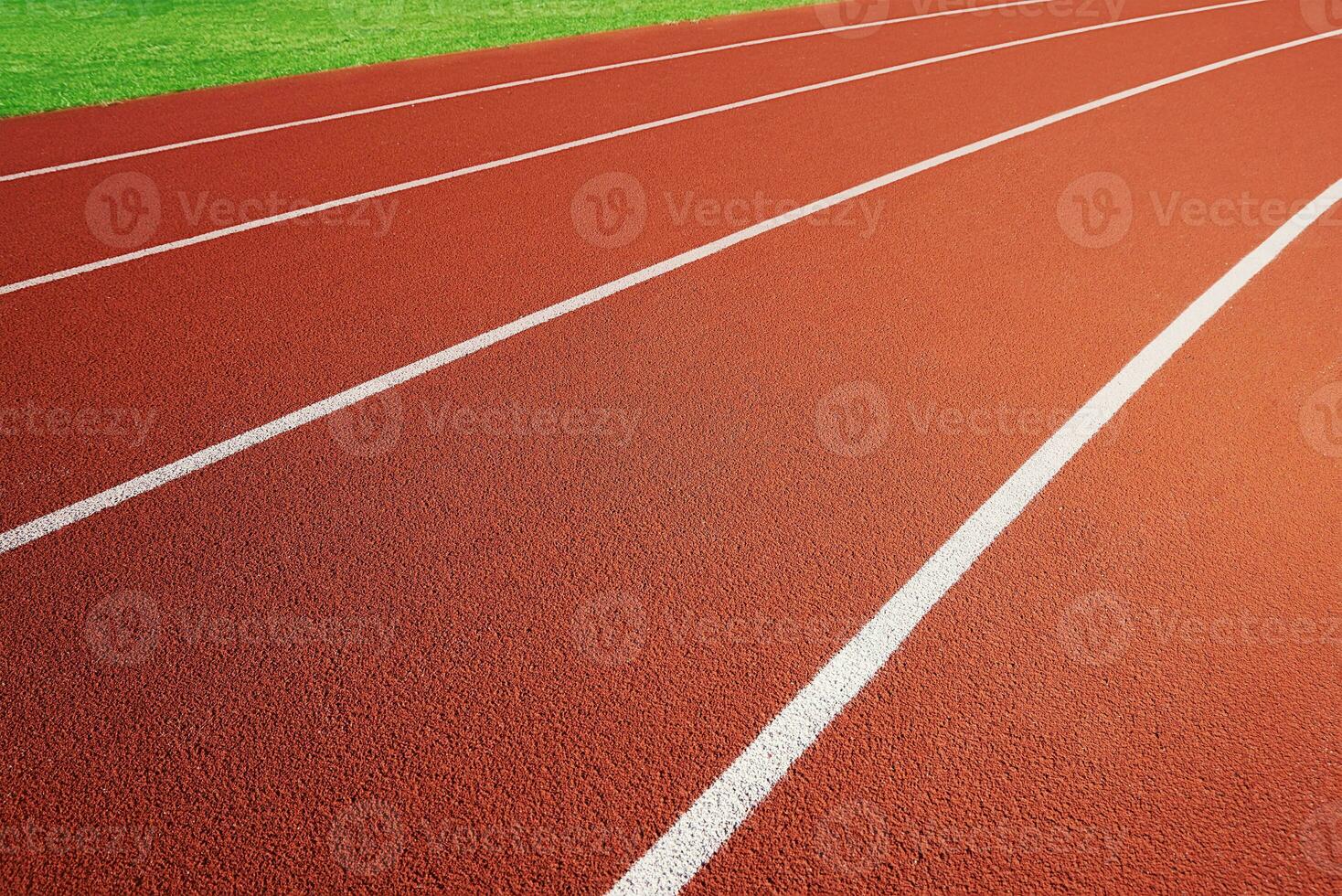 rojo corriendo pista a estadio con frontera carriles foto