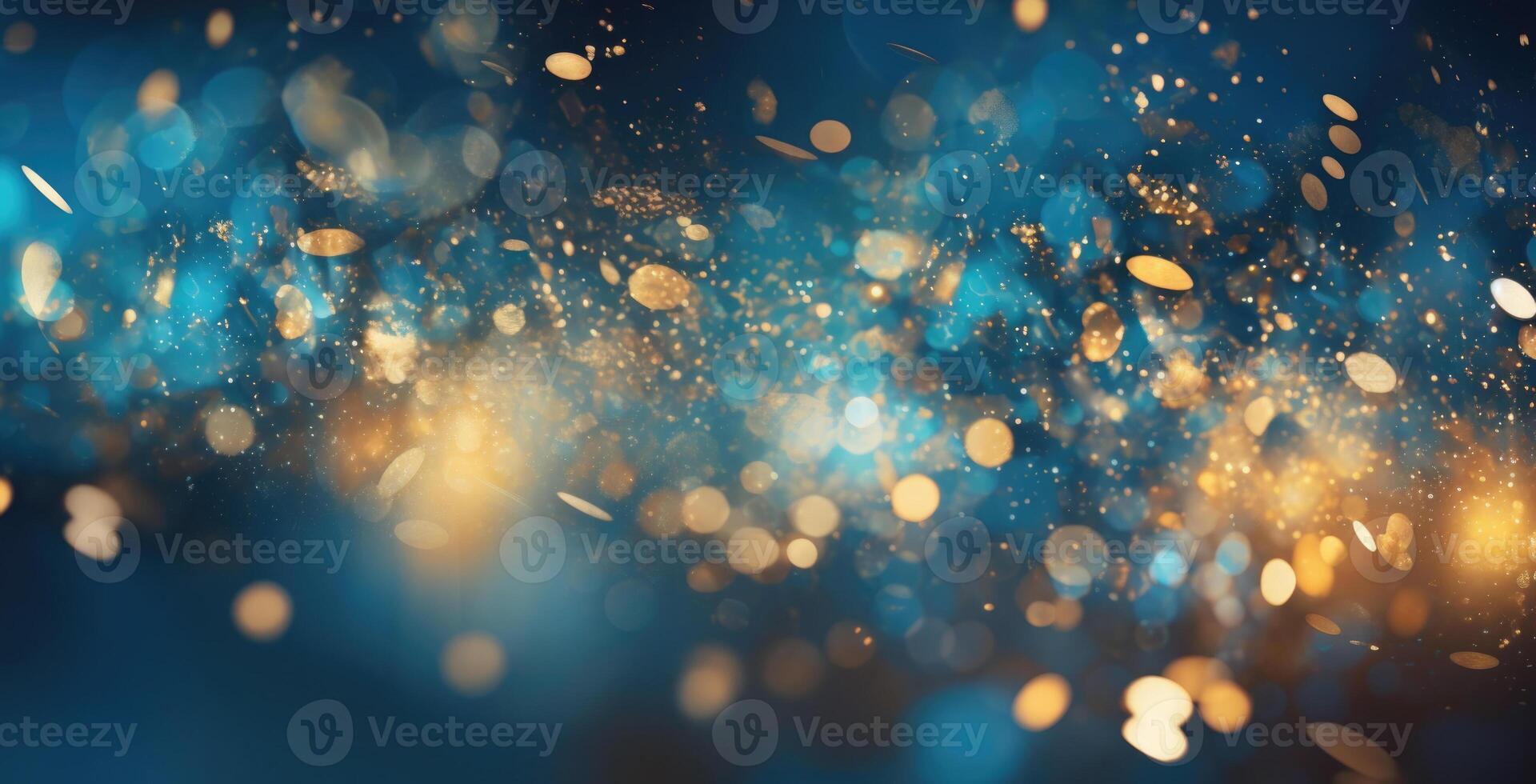 Festive golden glitter and sparkles on dark background. photo