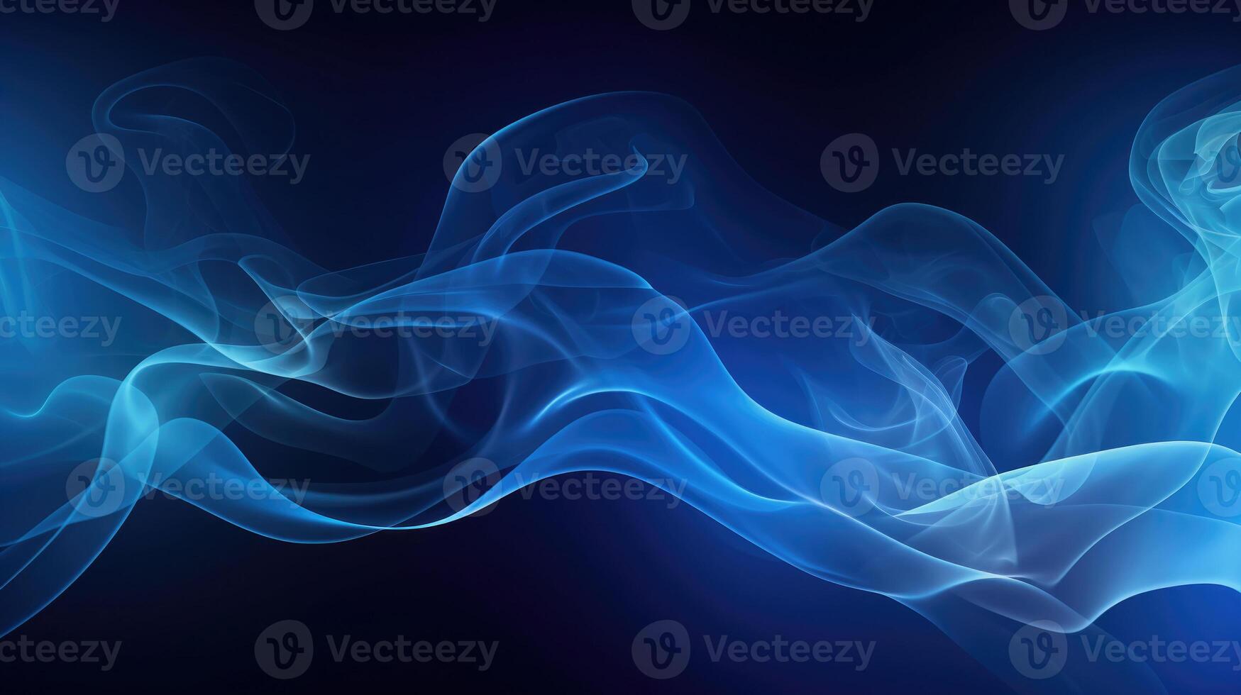 Smoke swirling effect. Ink drop in water on dark blue background. photo