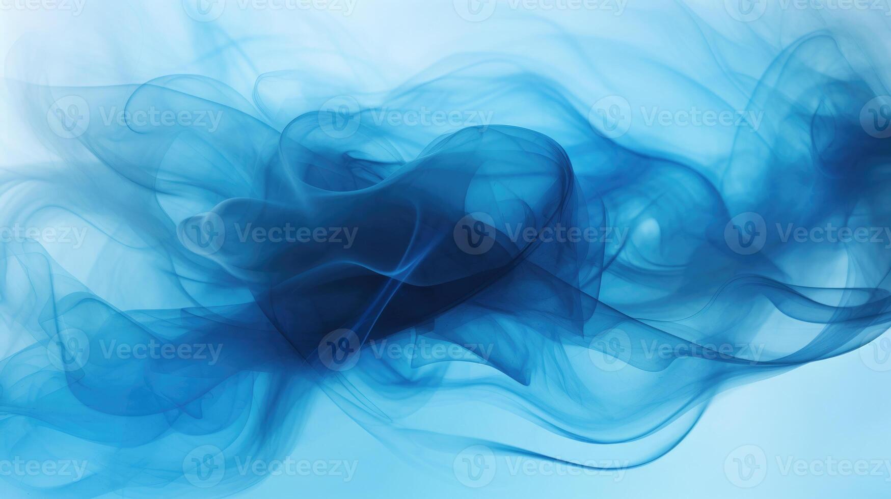Smoke swirling effect. Ink drop in water on dark blue background. photo