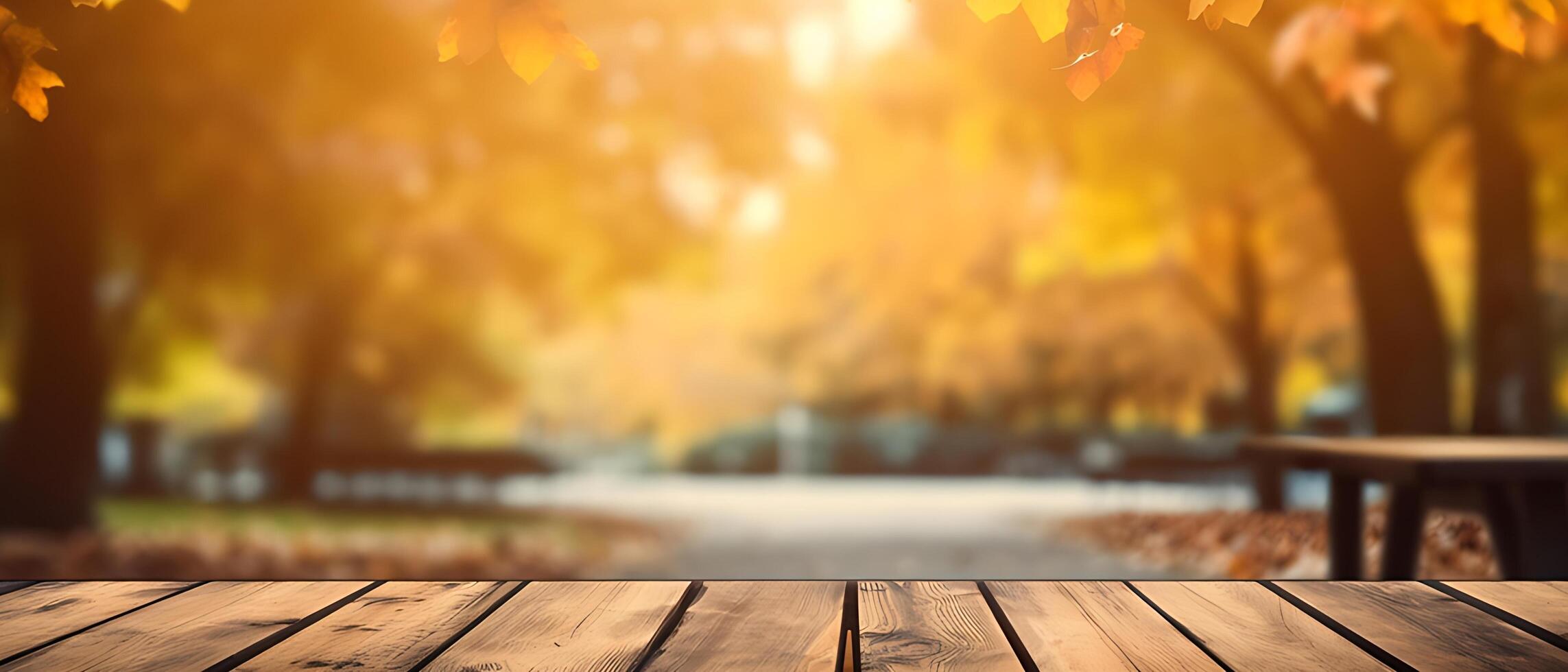 Empty Wooden table in garden of fall time. photo