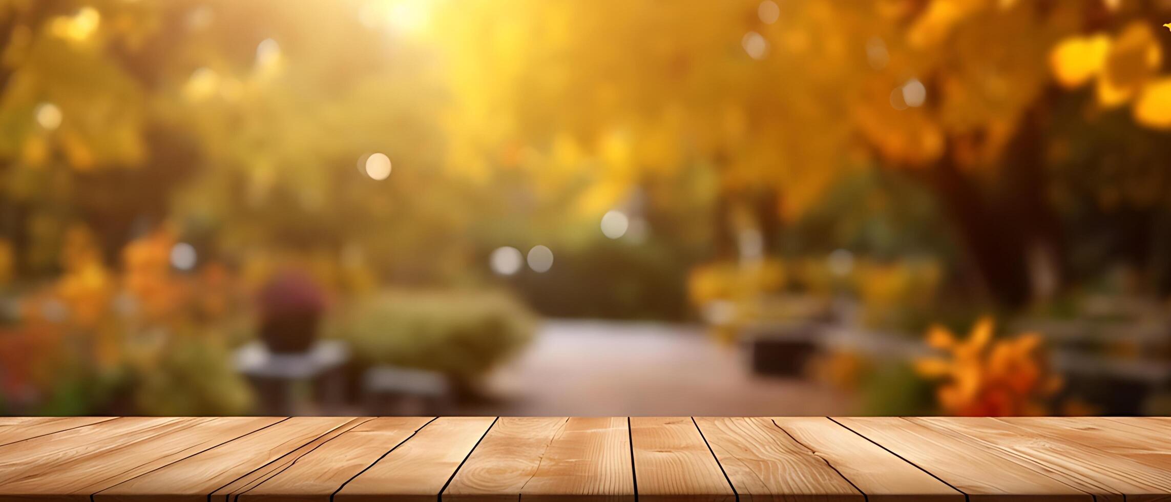 Empty Wooden table in garden of fall time. photo