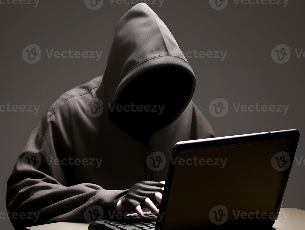 Hacker typing laptop. Concept of cybercrime, cyberattack, dark web. photo