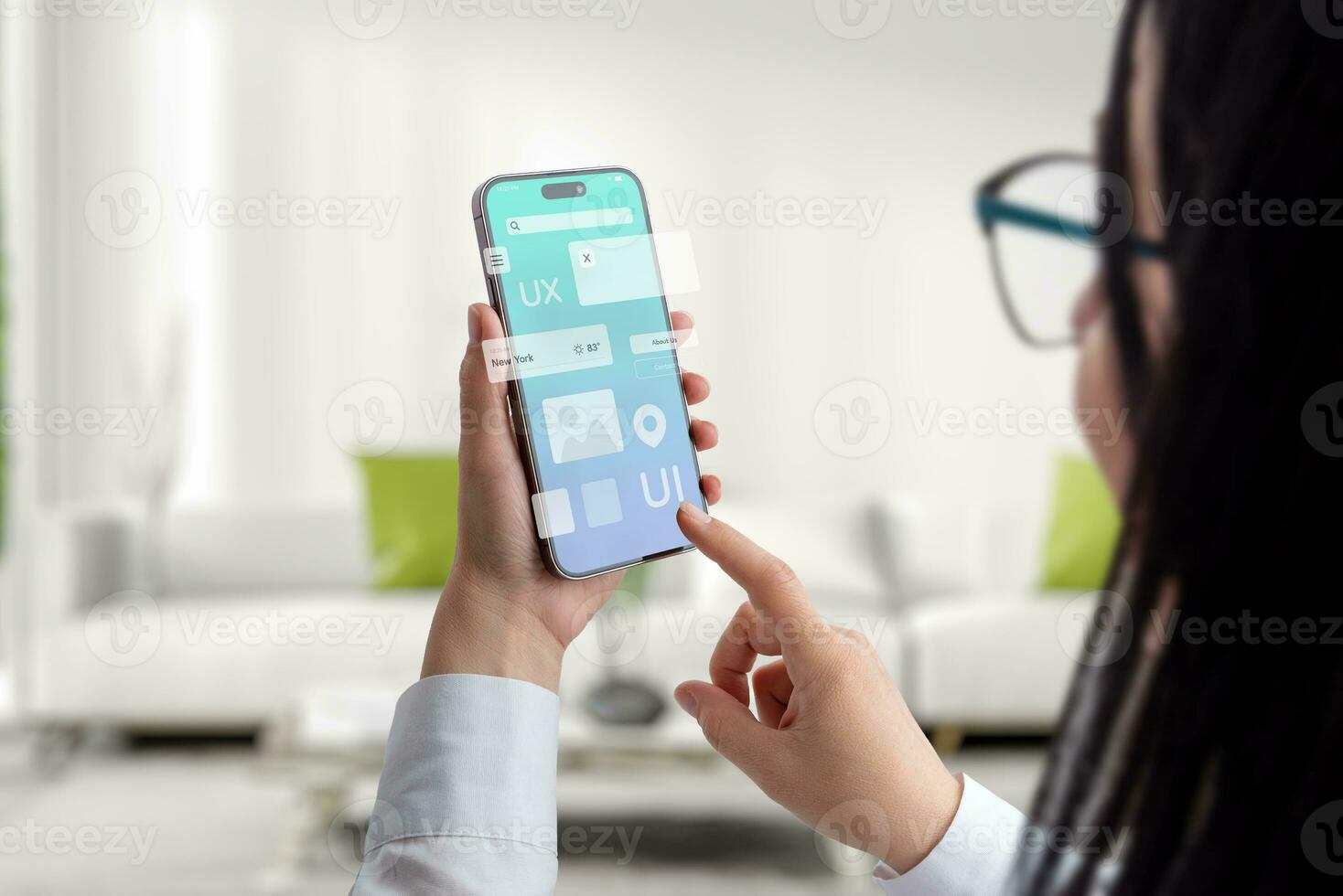 User interface and experience concept app on smart phone in woman hands. Clean design with flying app modules concept photo