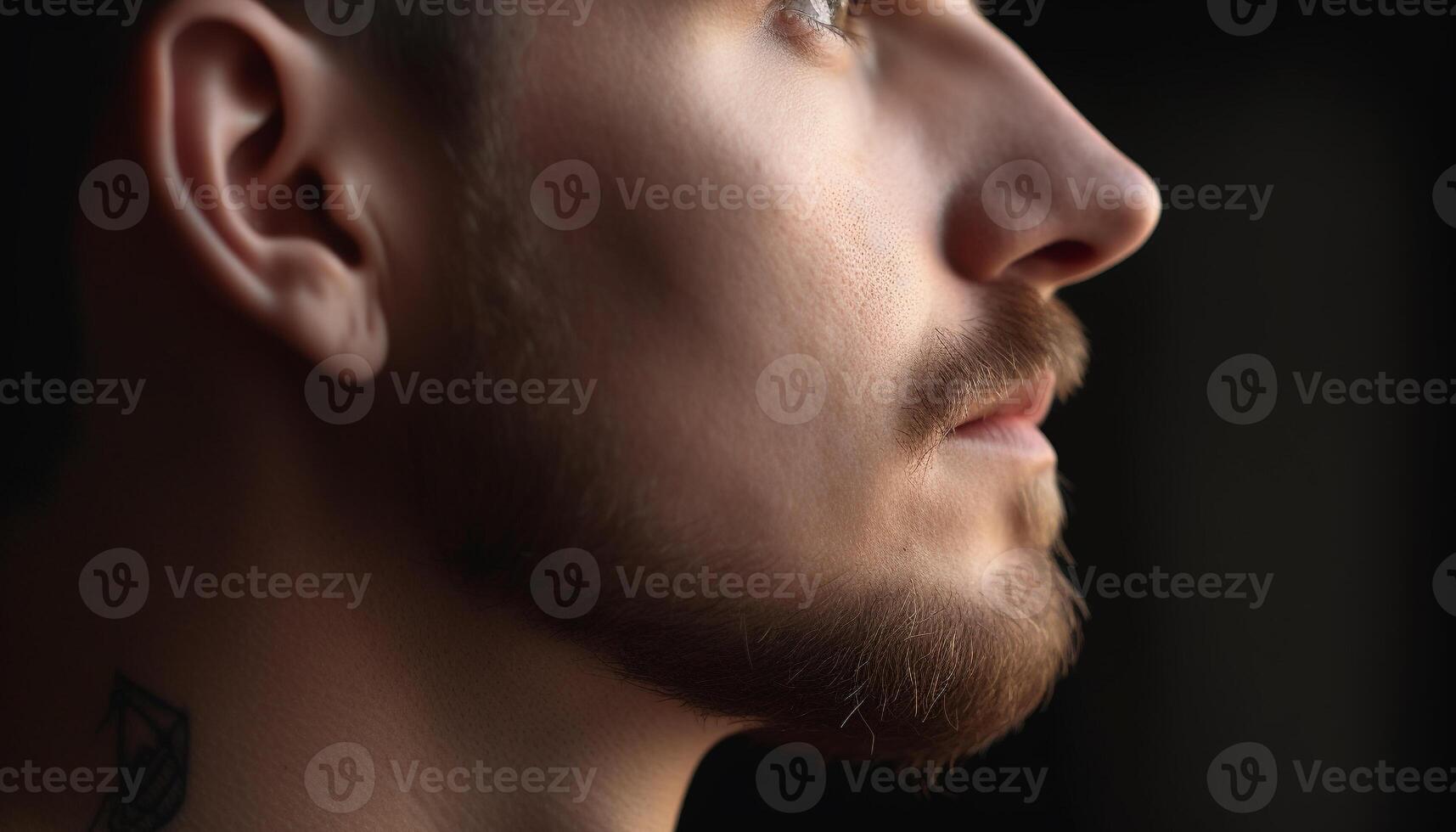 Handsome young adult with beard in contemplation, serious and sad generated by AI photo