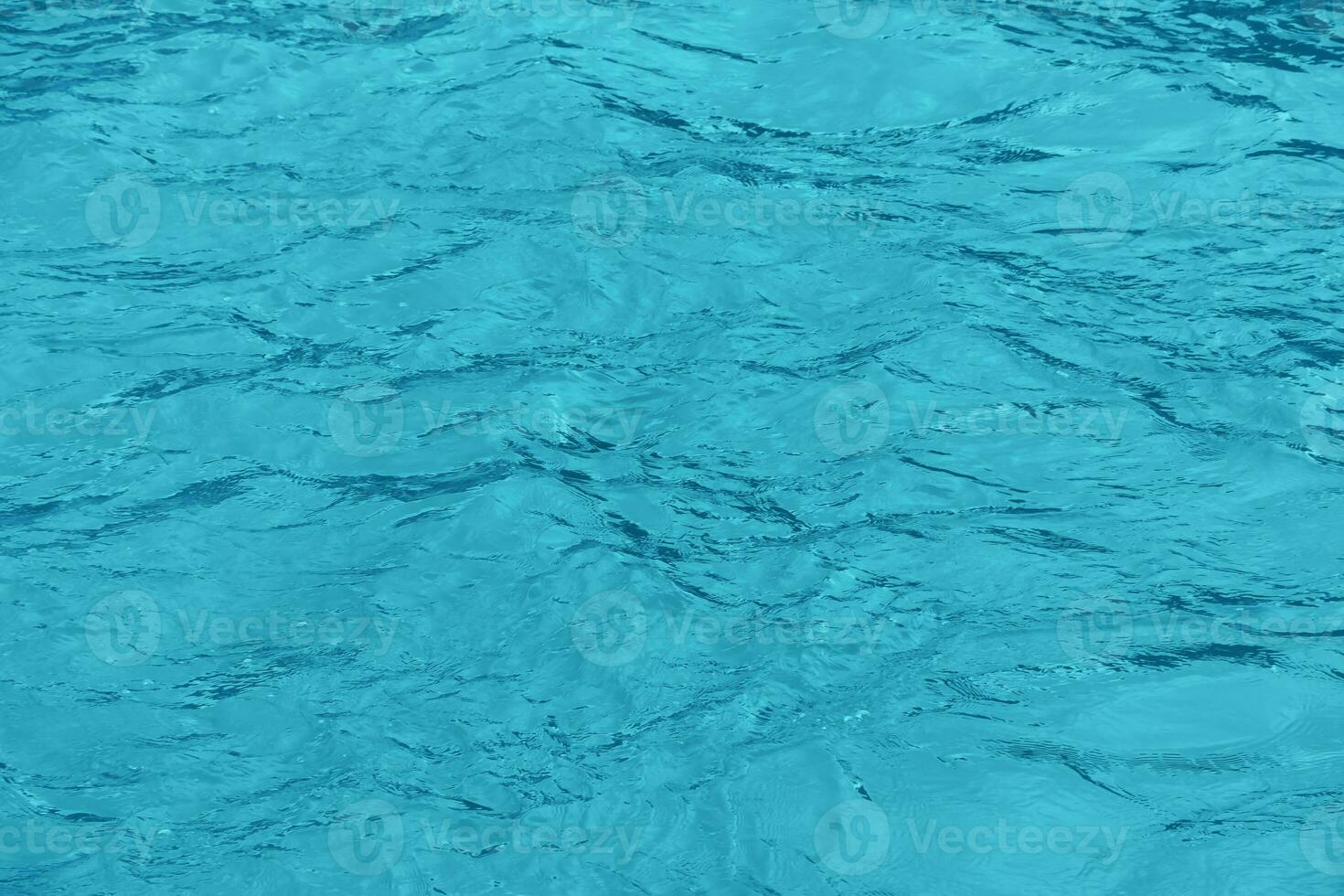 The texture of the water of the river. Natural water background with ripples and waves. photo