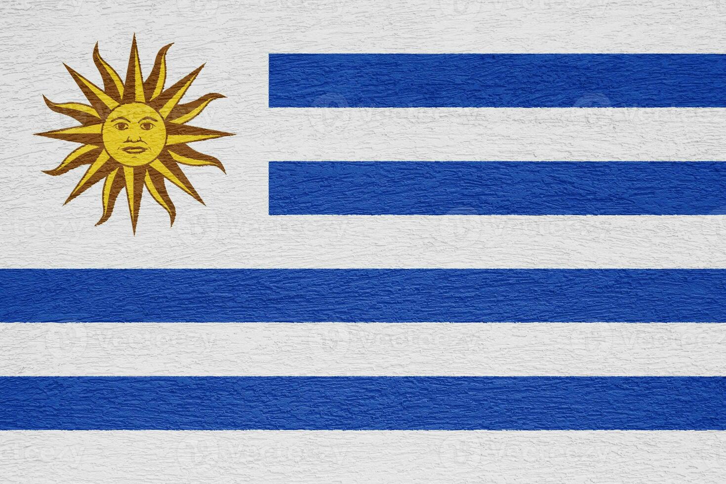 Flag of Eastern Republic of Uruguay on a textured background. Concept collage. photo