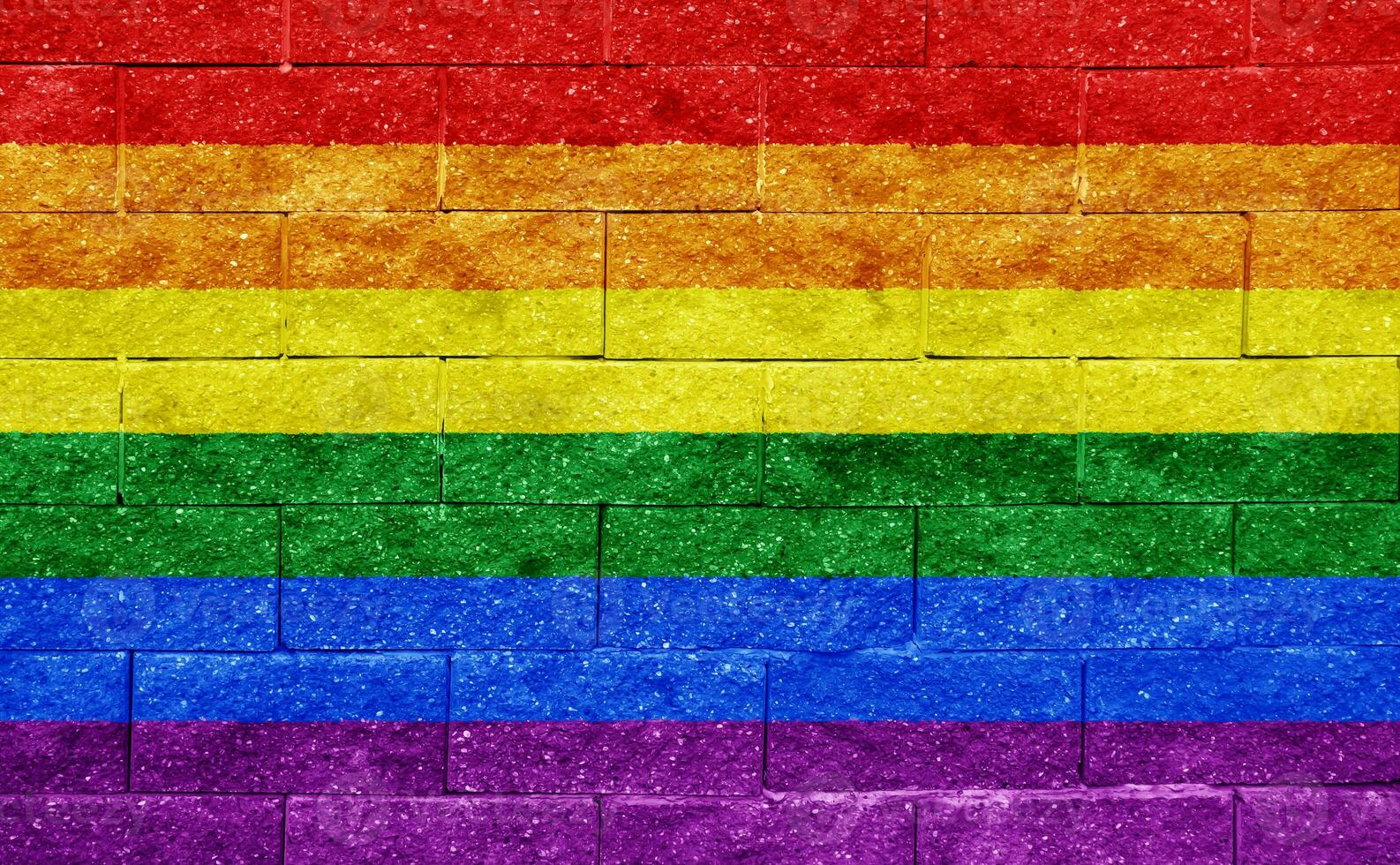 Flag of the LGBT community on the background of a stone wall. Rainbow symbol of gay culture. Concept collage. Illustration symbol of pride. photo