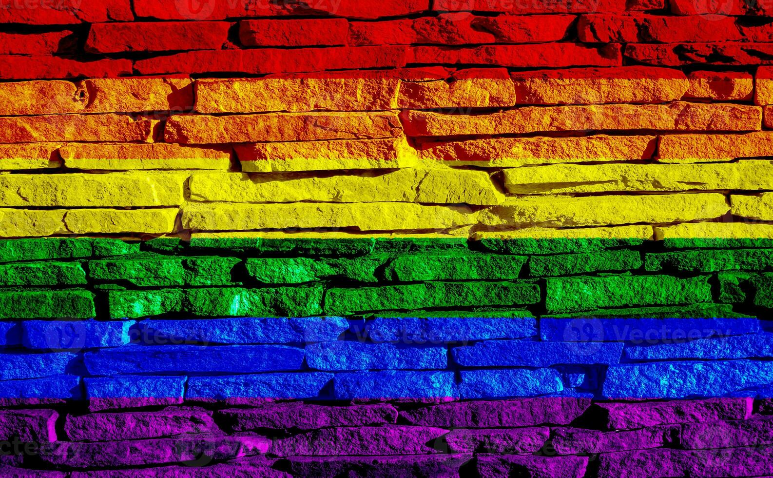 Flag of the LGBT community on the background of a stone wall. Rainbow symbol of gay culture. Concept collage. Illustration symbol of pride. photo