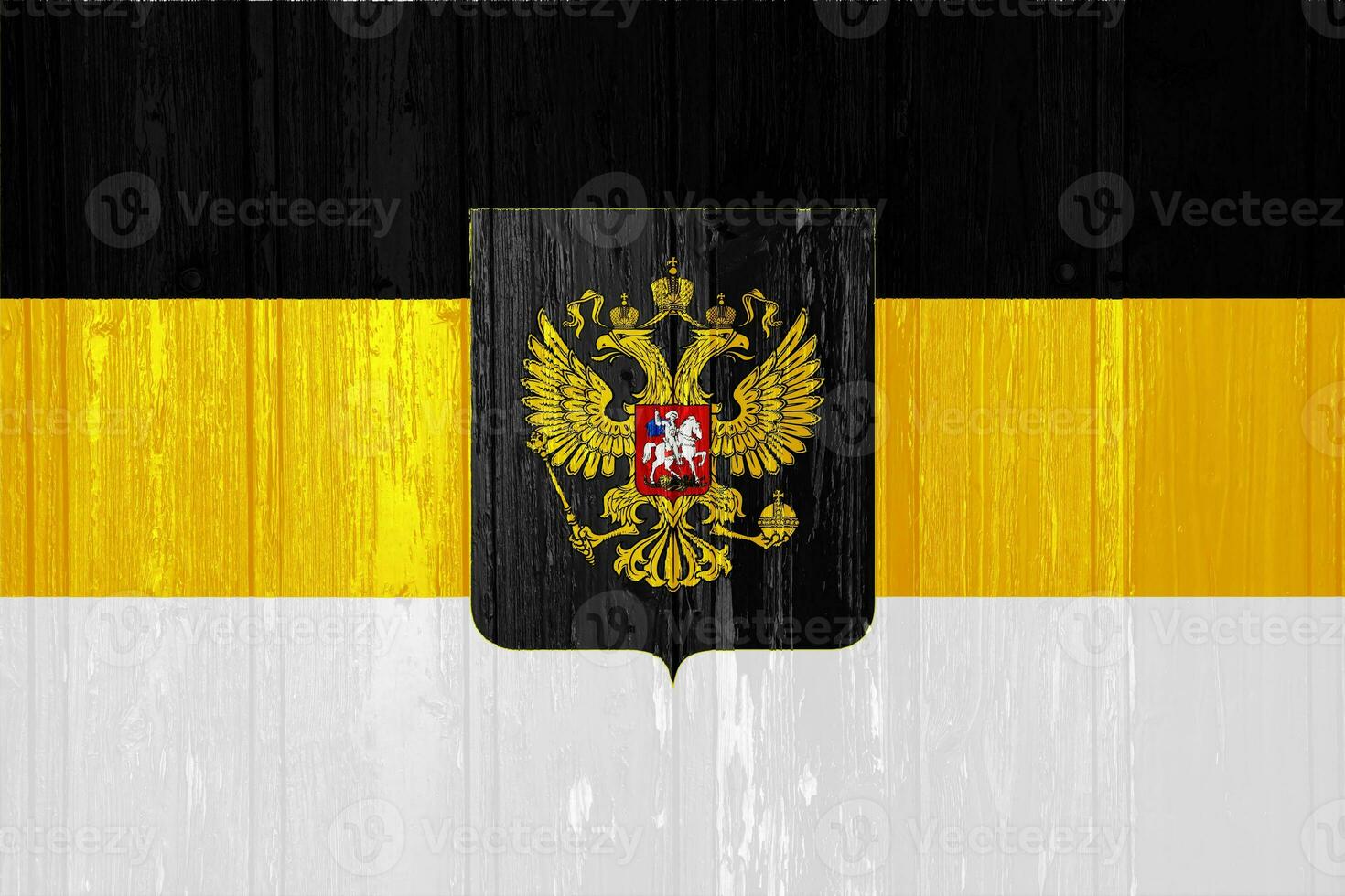 Russian imperial flag with a double-headed eagle. The first official State flag of the Russian Empire and the Flag for celebrations on the texture. Concept collage. photo