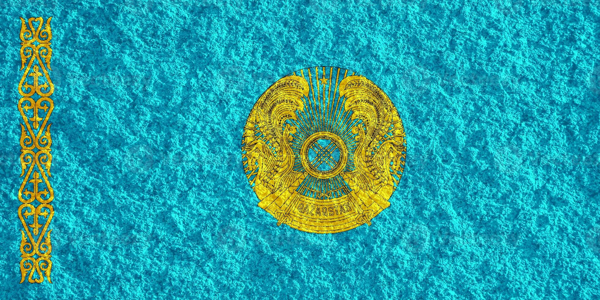 Flag of and coat of arms Republic of Kazakhstan on a textured background. Concept collage. photo