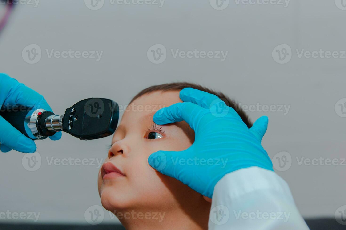 doctor using ostomoscope photo