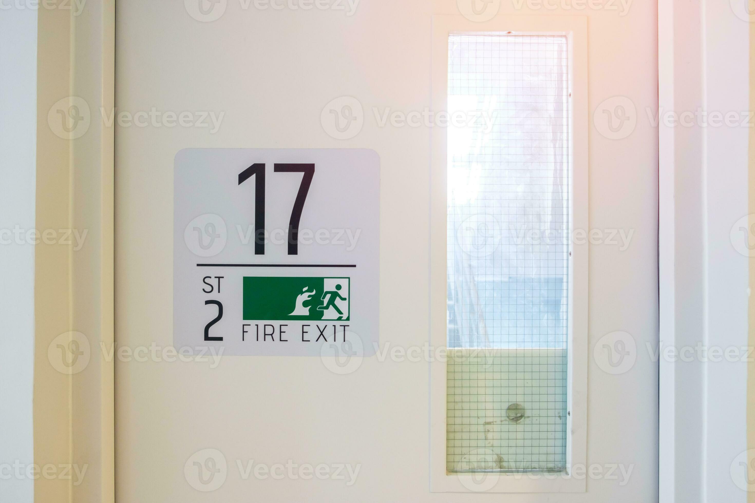 Fire Exit door sign for emergency. Stairwell fire for escape in