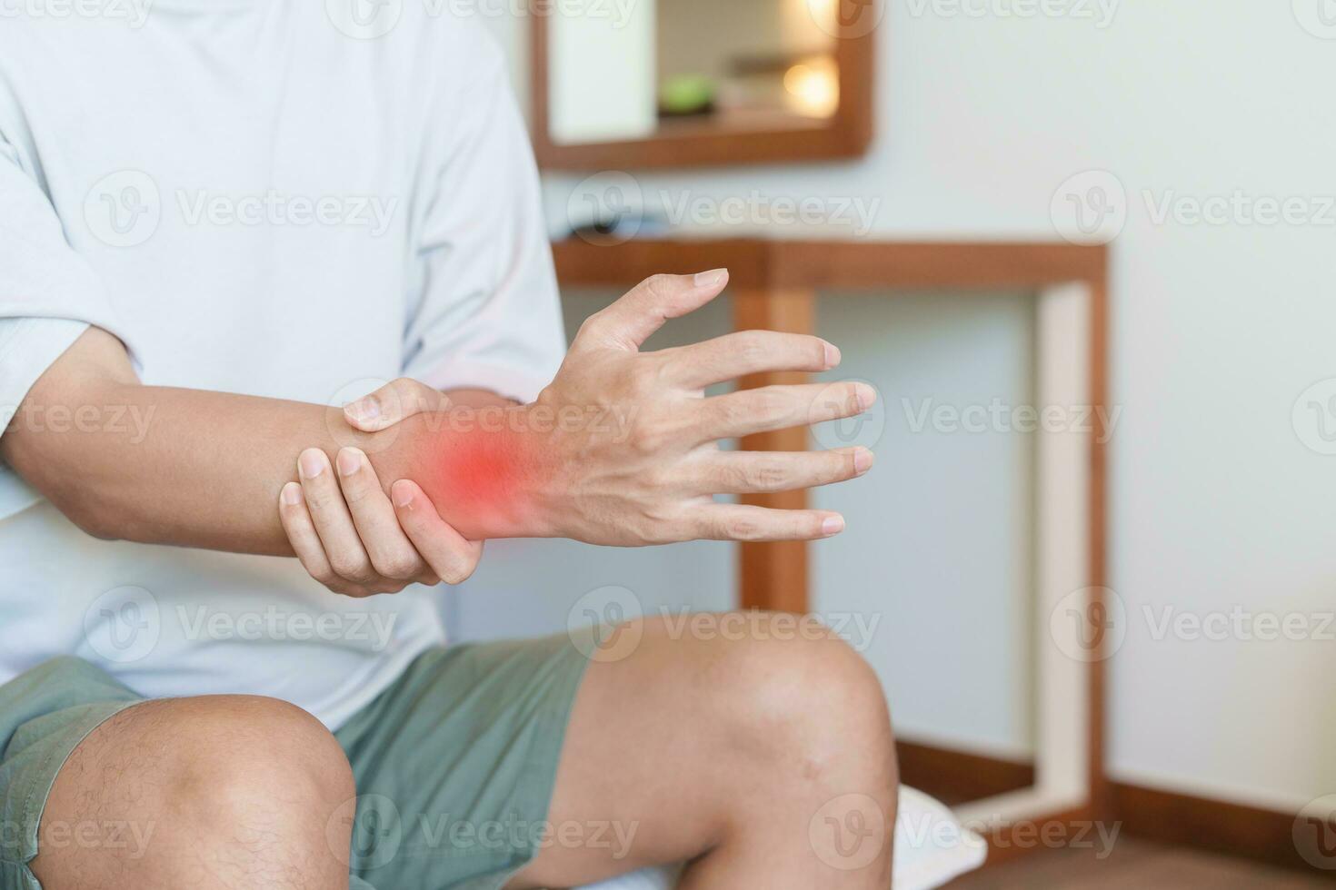 man having wrist pain because using smartphone or computer long time. De Quervain s tenosynovitis, rheumatism, arthritis, osteoarthritis, ergonomic, Carpal Tunnel Syndrome or Office syndrome photo