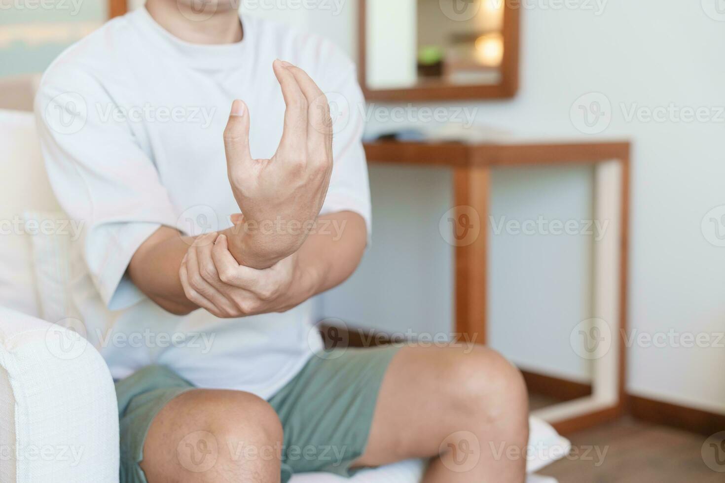 man having wrist pain because using smartphone or computer long time. De Quervain s tenosynovitis, rheumatism, arthritis, osteoarthritis, ergonomic, Carpal Tunnel Syndrome or Office syndrome photo