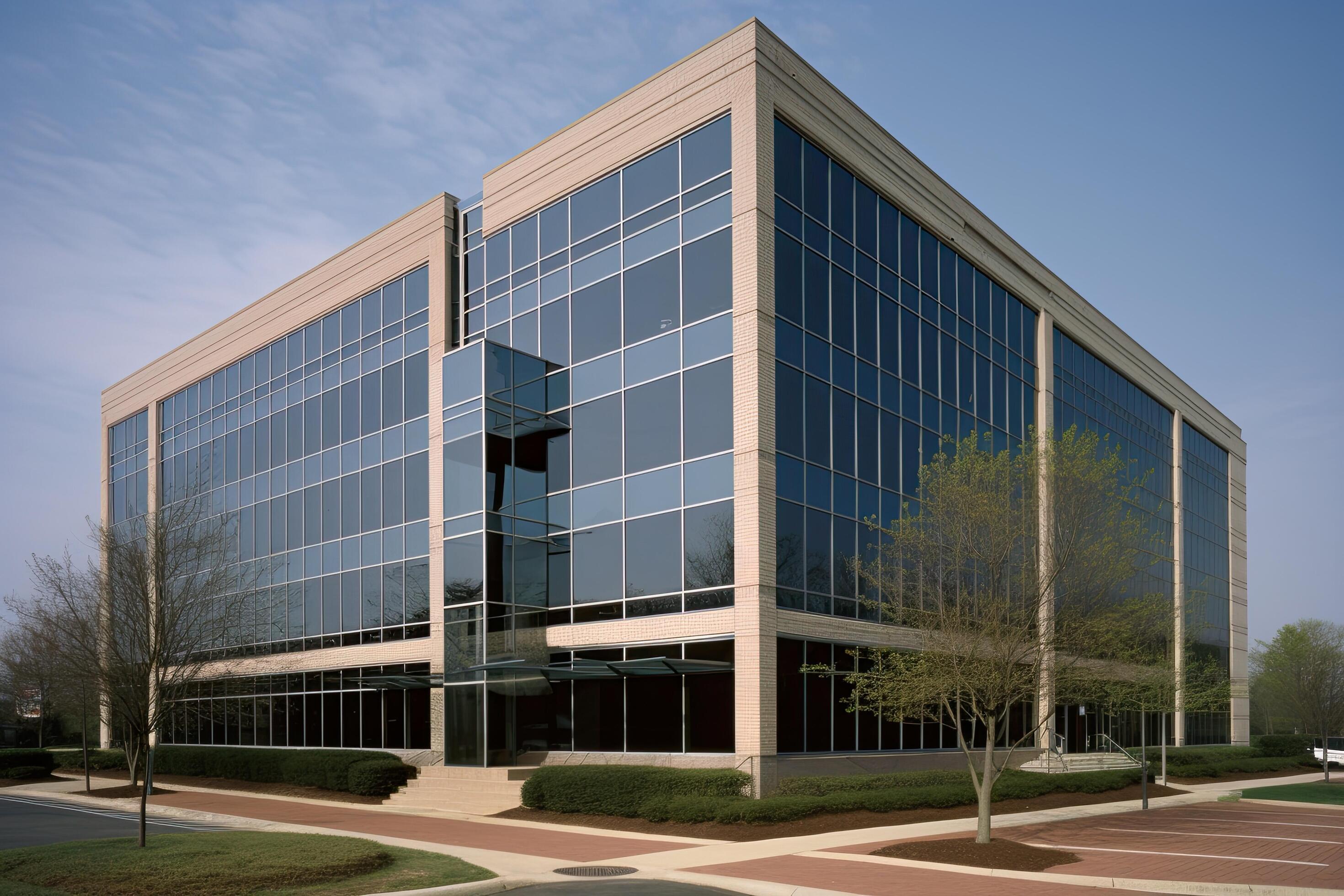 Modern office building with blue sky background. Perspective view of