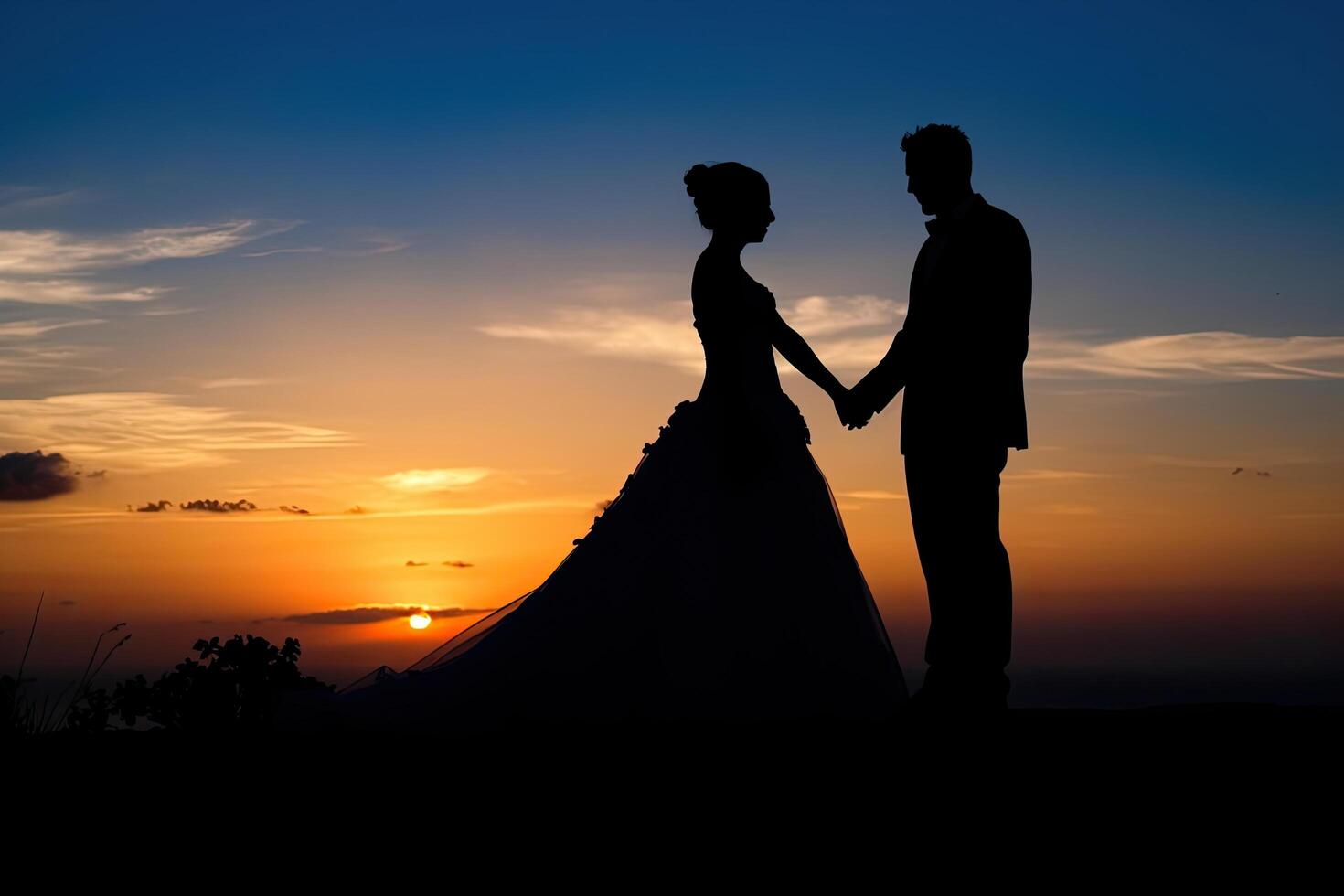 Silhouette of a bride and groom on the background of the setting sun, New wedding couple silhouette with a shiny sunset , photo