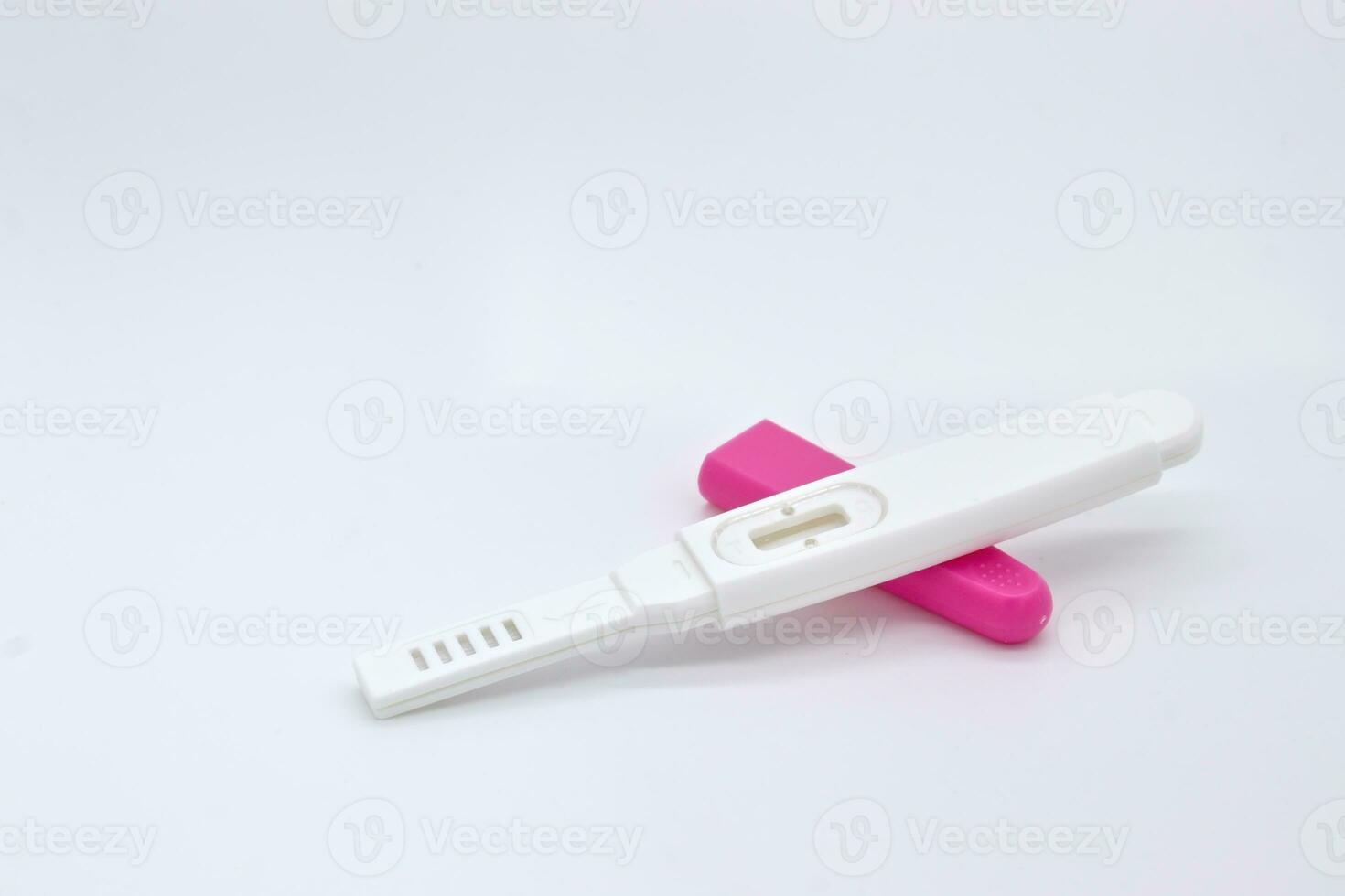 Pregnancy test kit on white background photo