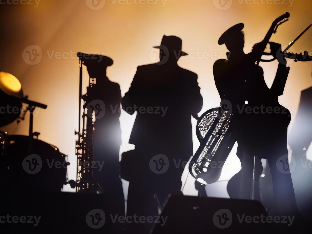 Silhouette of a musicians playing jazz. photo