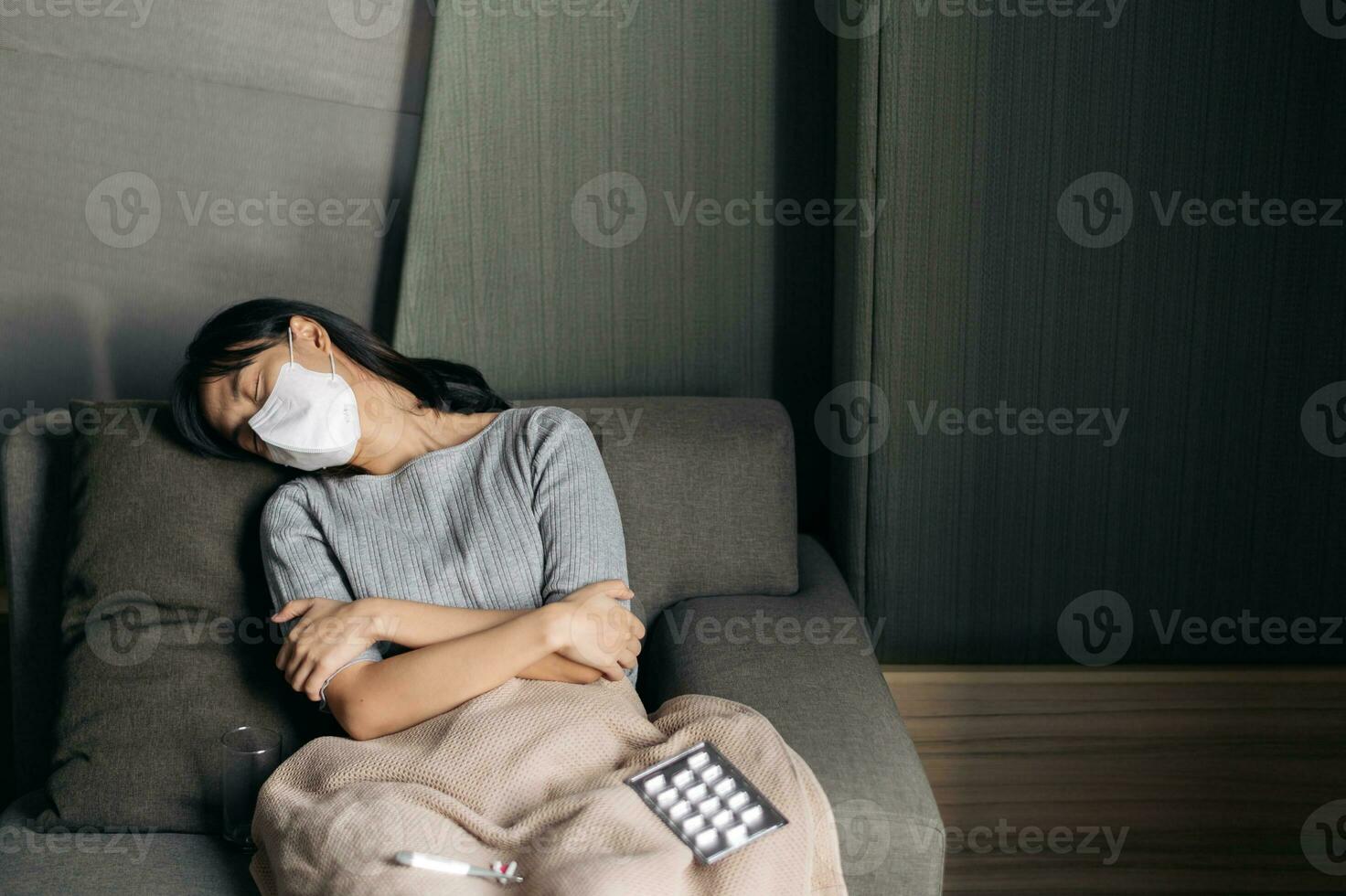 Asian woman with cold and flu sleeping on sofa bed at home. 25504544