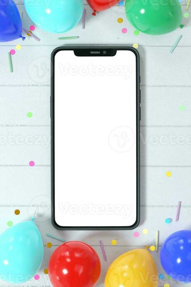 Smartphone mockup with colorful balloons confetti and birthday candles photo