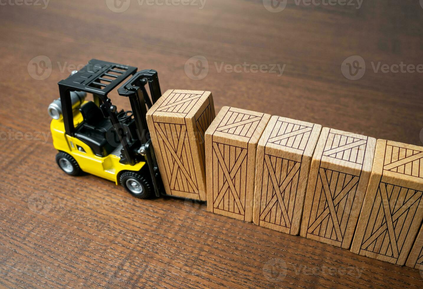 A forklift transports wooden crates. Transportation industry. Transport department. Warehousing, logistics concept. Sign large contracts for the purchase and supply of equipment. Humanitarian missions photo
